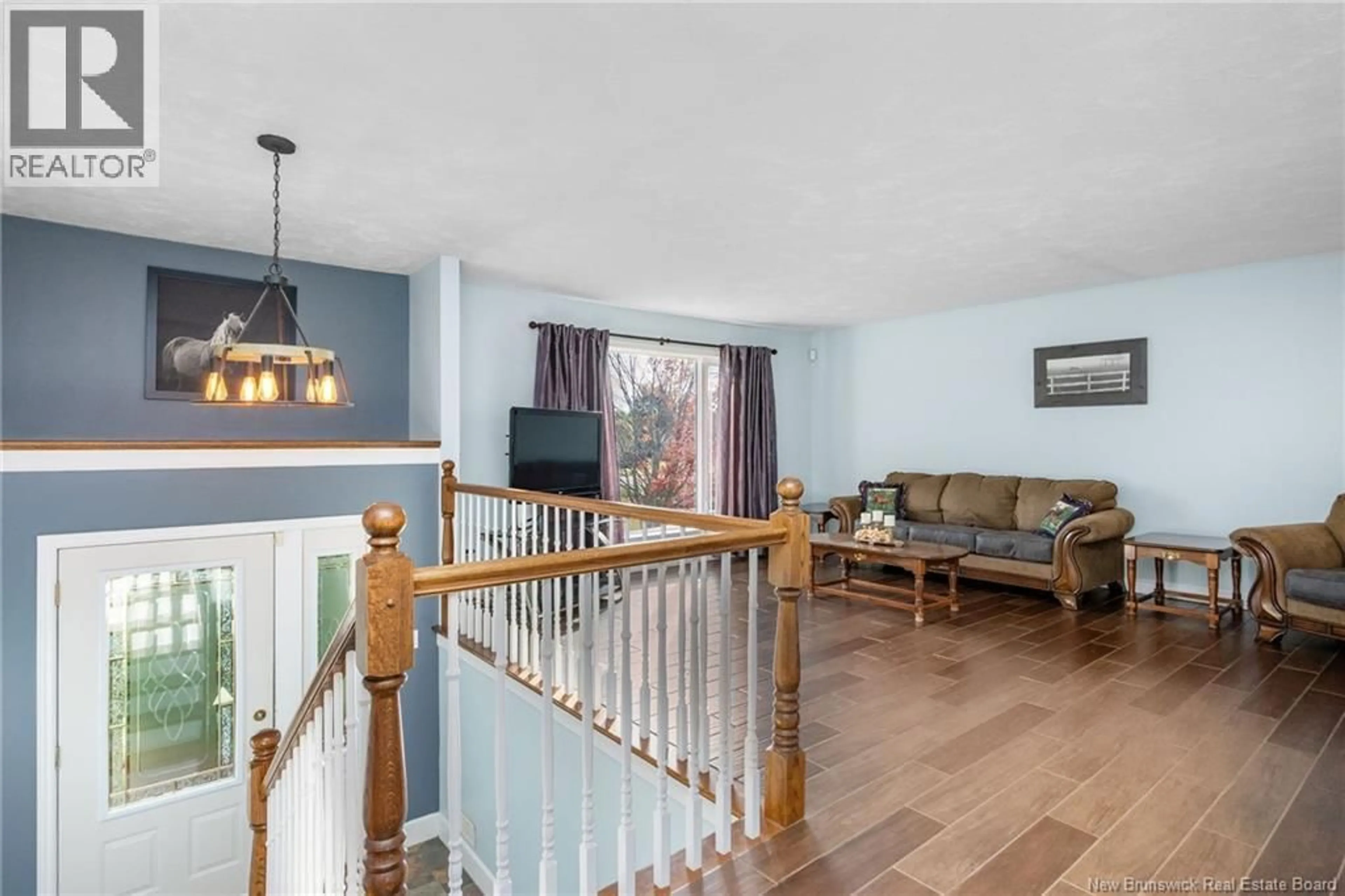 Living room with furniture, wood/laminate floor for 4072 ROUTE 115, Notre-Dame New Brunswick E4V2J7