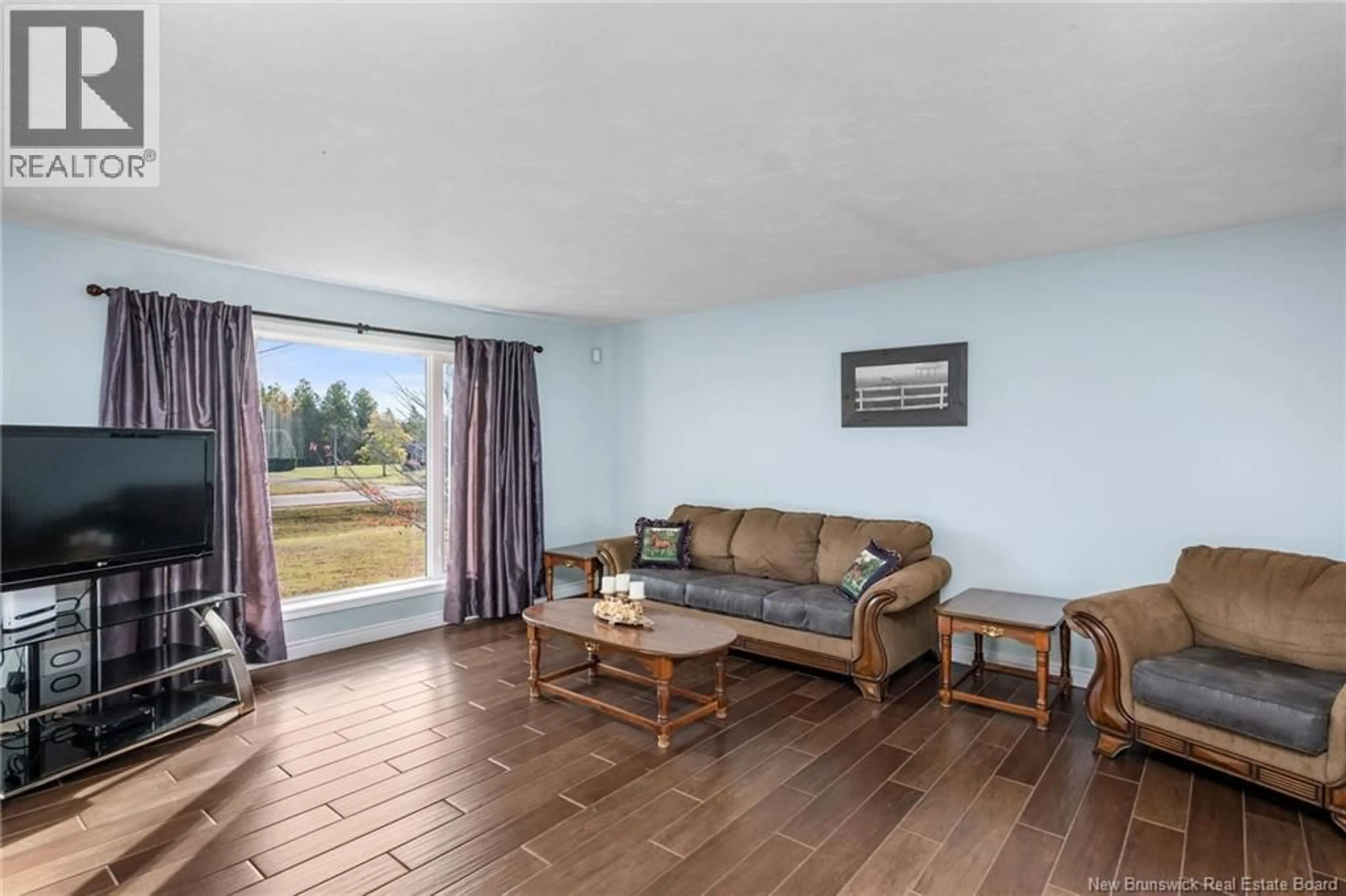 Living room with furniture, wood/laminate floor for 4072 ROUTE 115, Notre-Dame New Brunswick E4V2J7