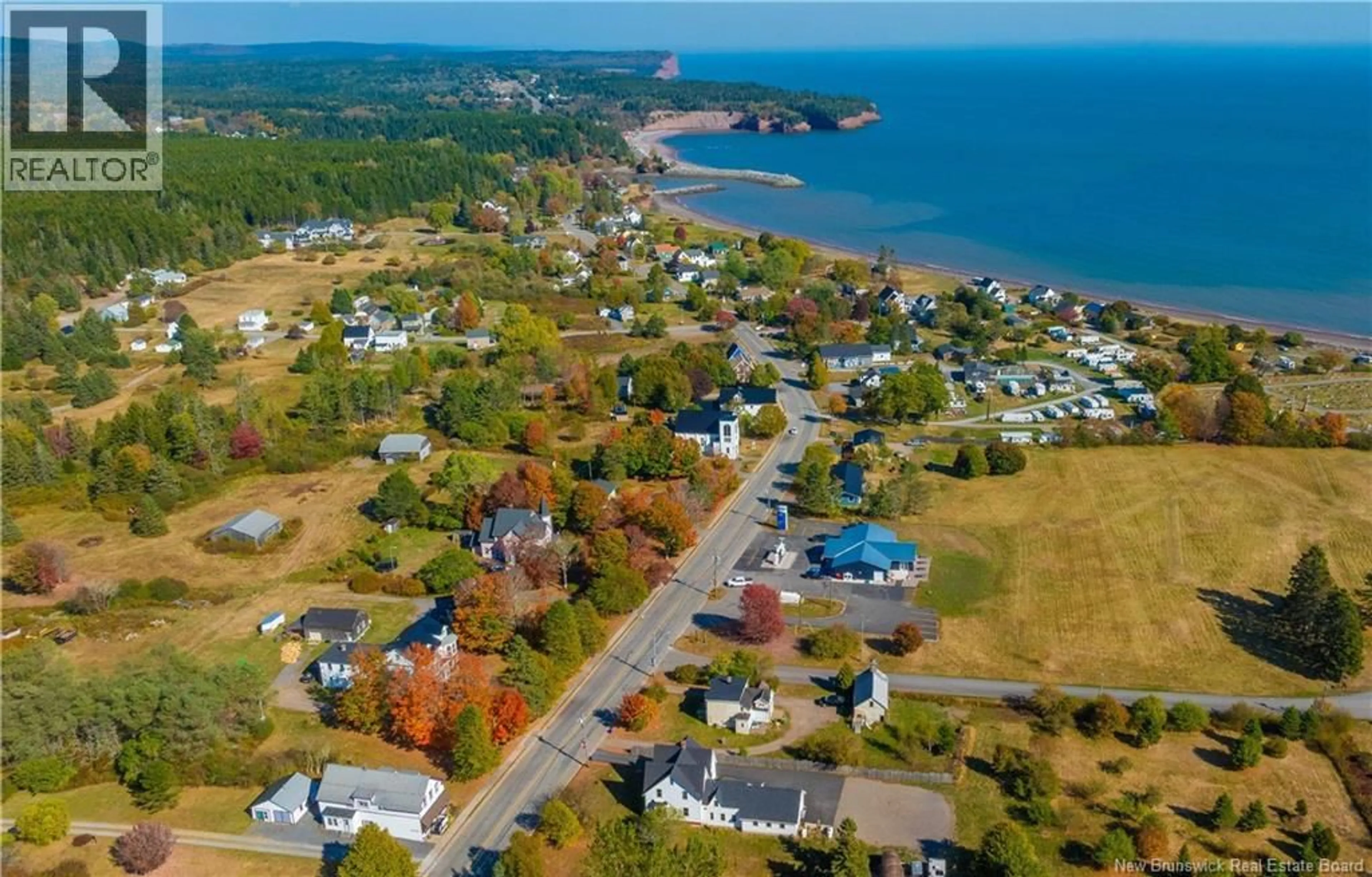 A pic from outside/outdoor area/front of a property/back of a property/a pic from drone, water/lake/river/ocean view for 179 MAIN STREET, St. Martins New Brunswick E5R1B7