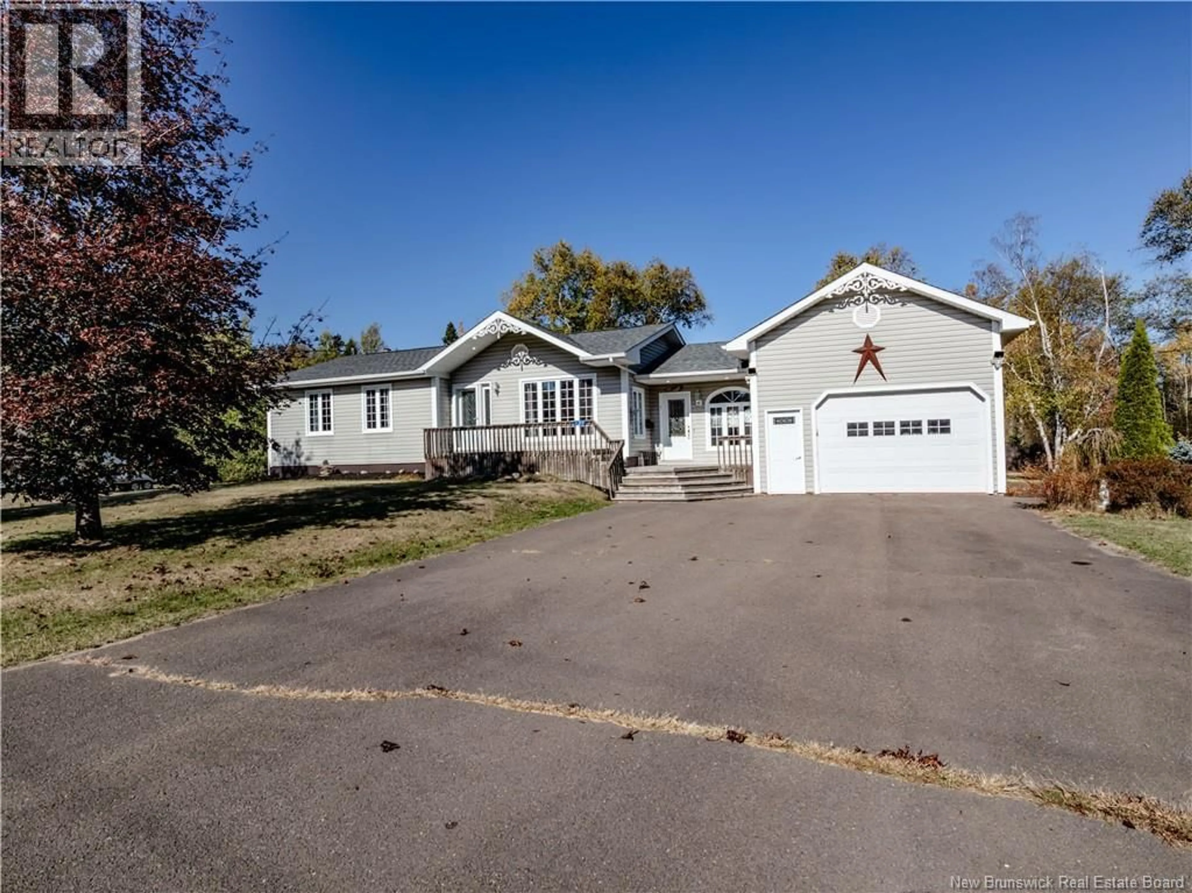 A pic from outside/outdoor area/front of a property/back of a property/a pic from drone, street for 139 POINTE DE PRUCHES STREET, Pointe-Sapin New Brunswick E4V1A6