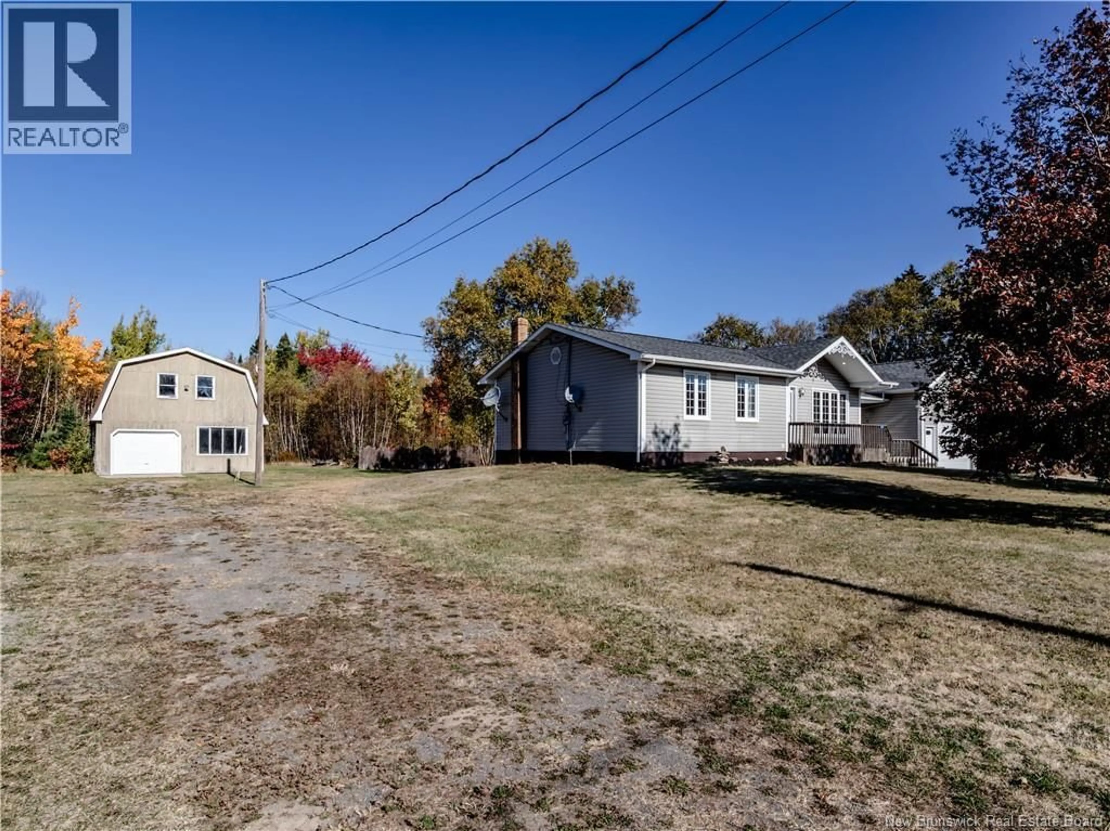 A pic from outside/outdoor area/front of a property/back of a property/a pic from drone, street for 139 POINTE DE PRUCHES STREET, Pointe-Sapin New Brunswick E4V1A6