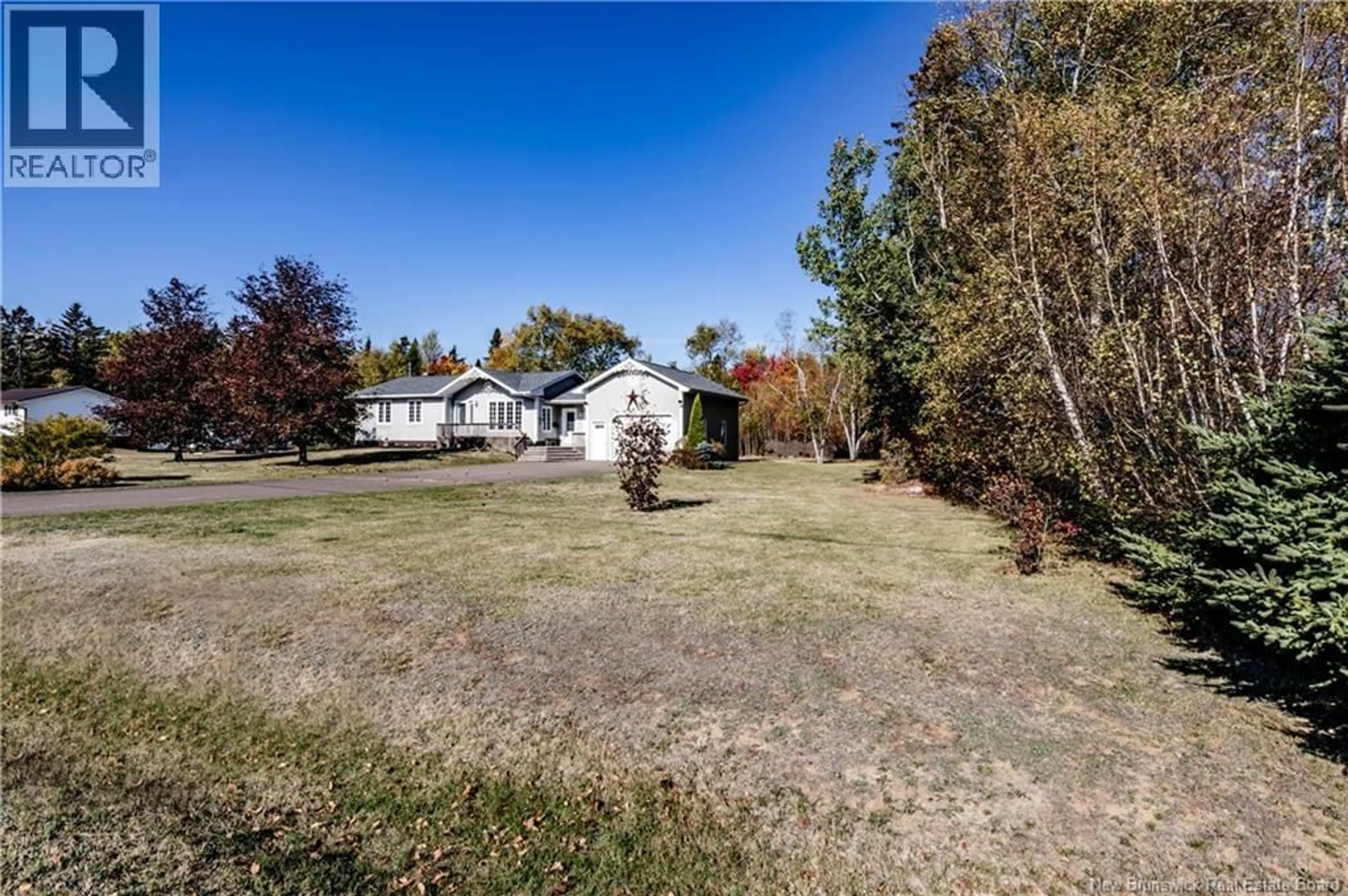 A pic from outside/outdoor area/front of a property/back of a property/a pic from drone, unknown for 139 POINTE DE PRUCHES STREET, Pointe-Sapin New Brunswick E4V1A6