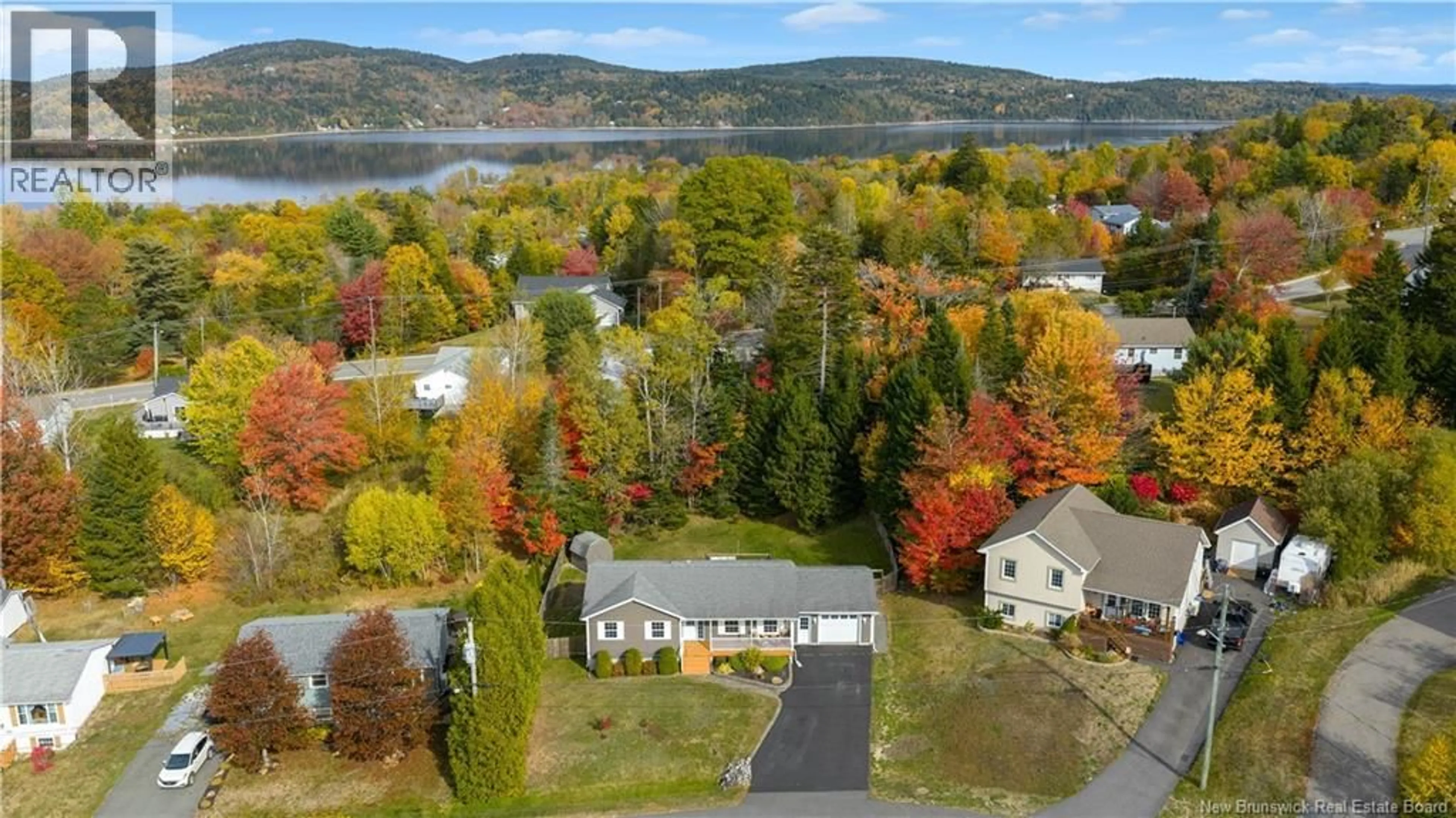 A pic from outside/outdoor area/front of a property/back of a property/a pic from drone, water/lake/river/ocean view for 9 CRYSTAL COURT, Grand Bay-Westfield New Brunswick E5K2C1