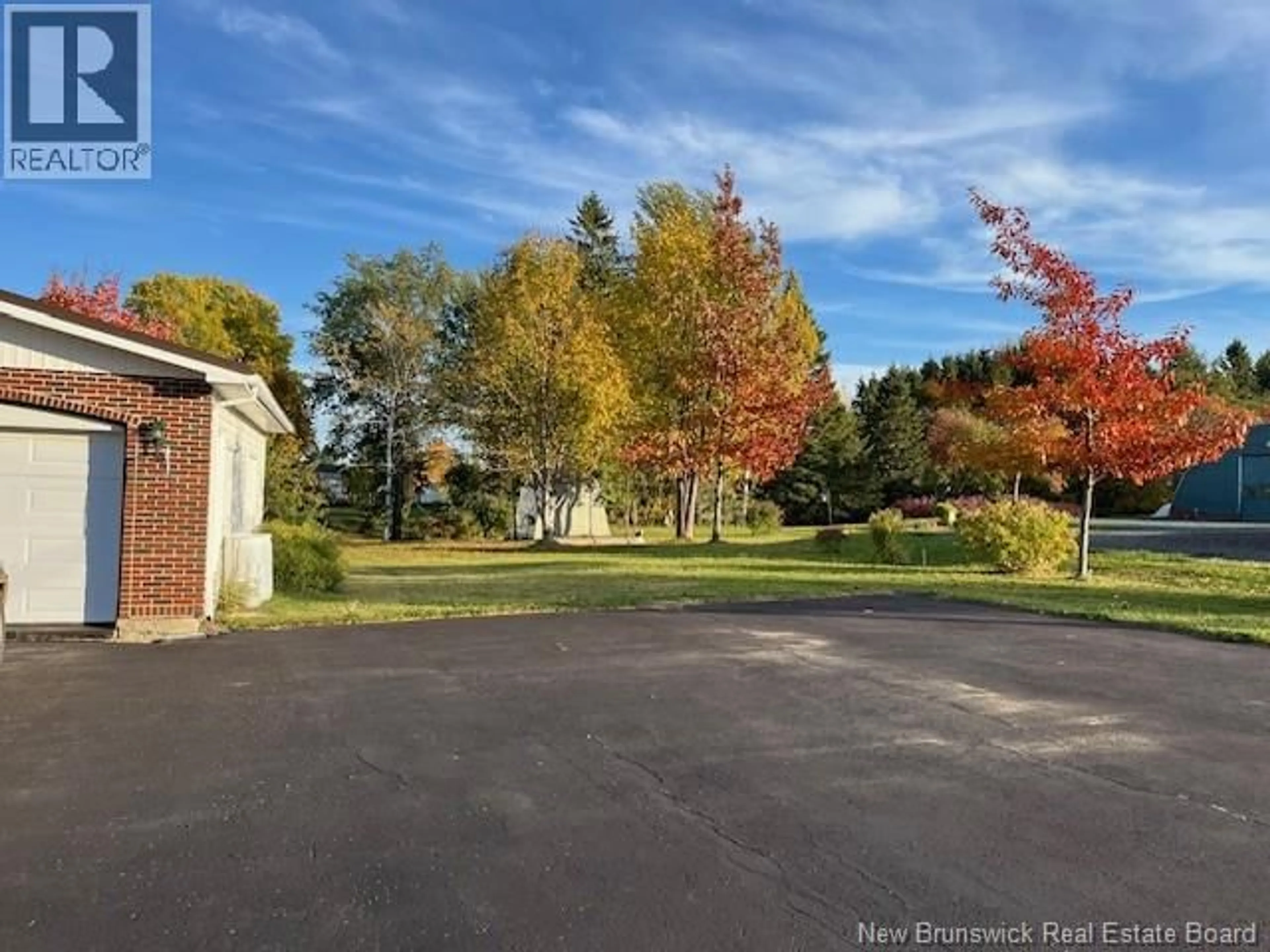 A pic from outside/outdoor area/front of a property/back of a property/a pic from drone, unknown for 7 ISABELLE STREET, Charlo New Brunswick E8E2L2