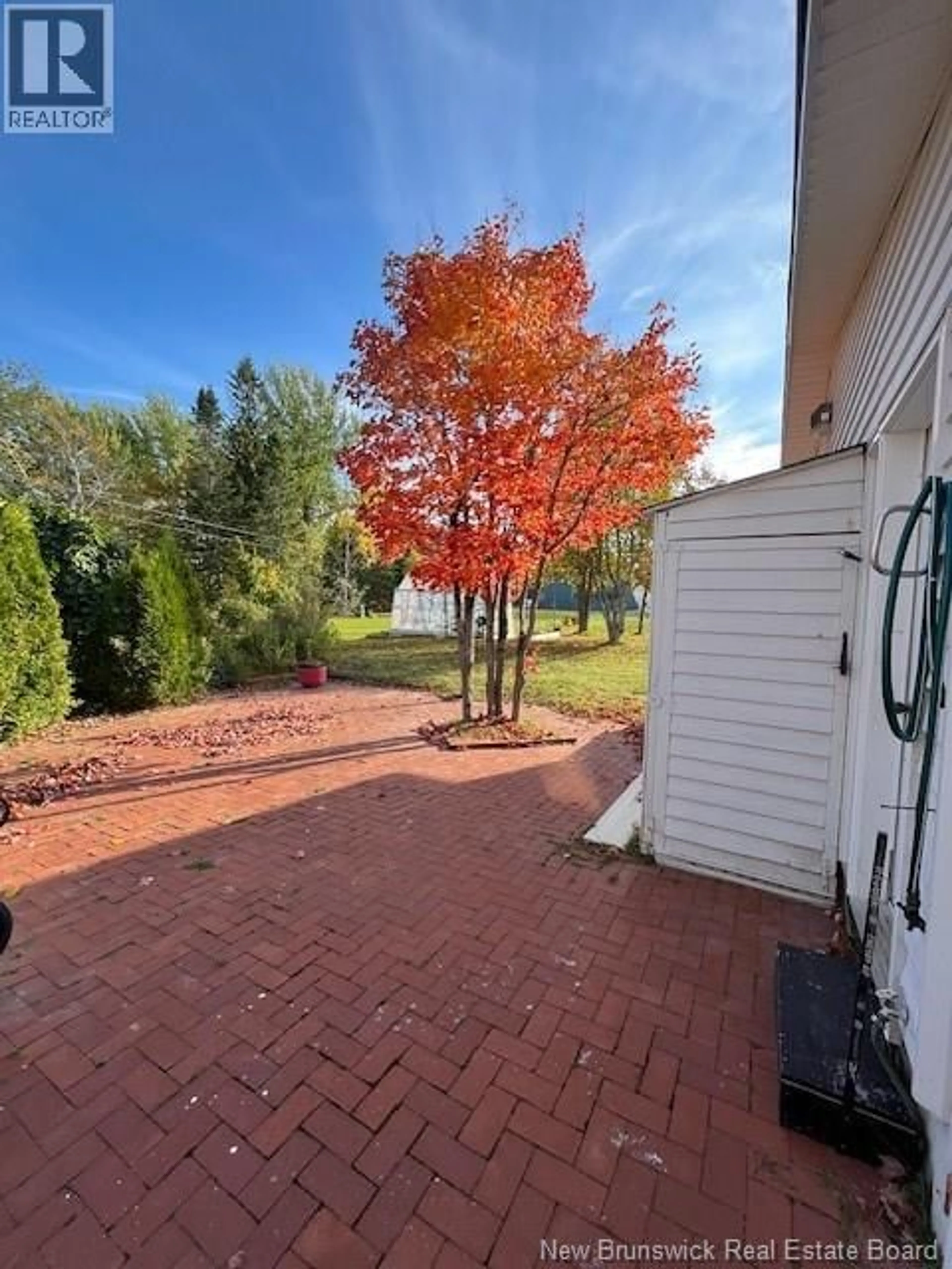A pic from outside/outdoor area/front of a property/back of a property/a pic from drone, unknown for 7 ISABELLE STREET, Charlo New Brunswick E8E2L2
