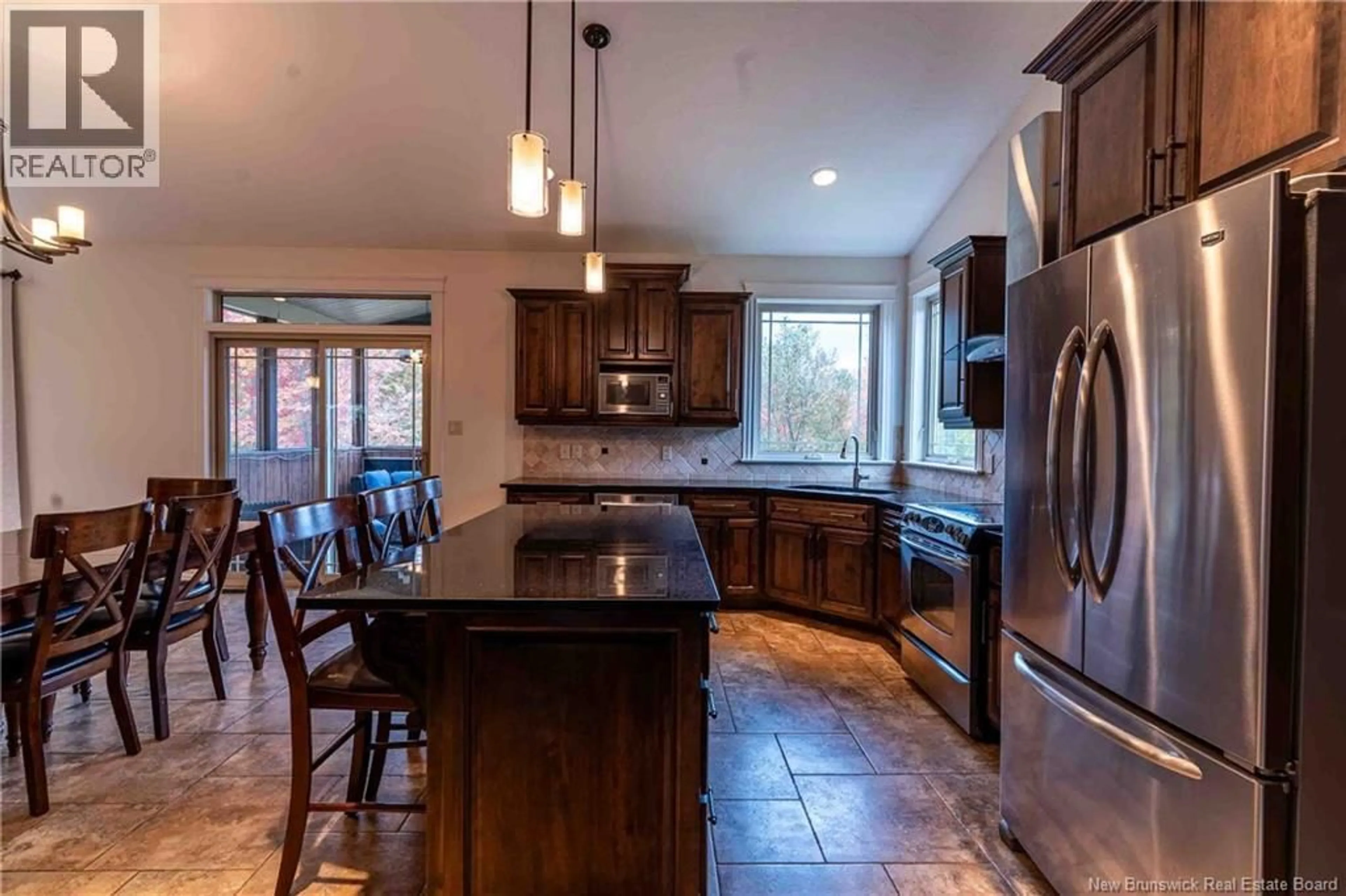 Open concept kitchen, ceramic/tile floor for 120 ANABELLE CRESCENT, Lutes Mountain New Brunswick E1G0R1
