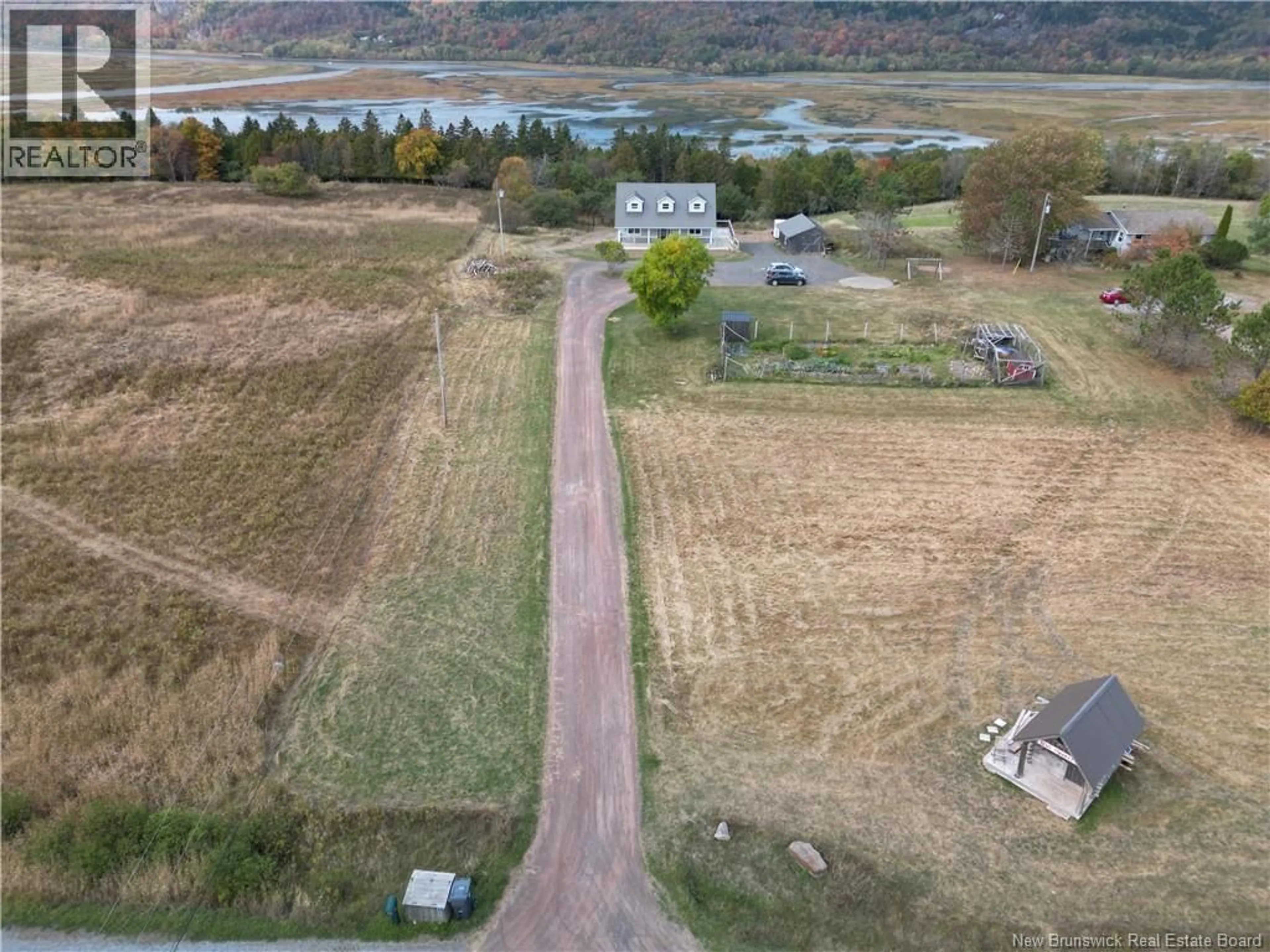 A pic from outside/outdoor area/front of a property/back of a property/a pic from drone, water/lake/river/ocean view for 357 DARLINGS ISLAND ROAD, Darlings Island New Brunswick E5N6S5