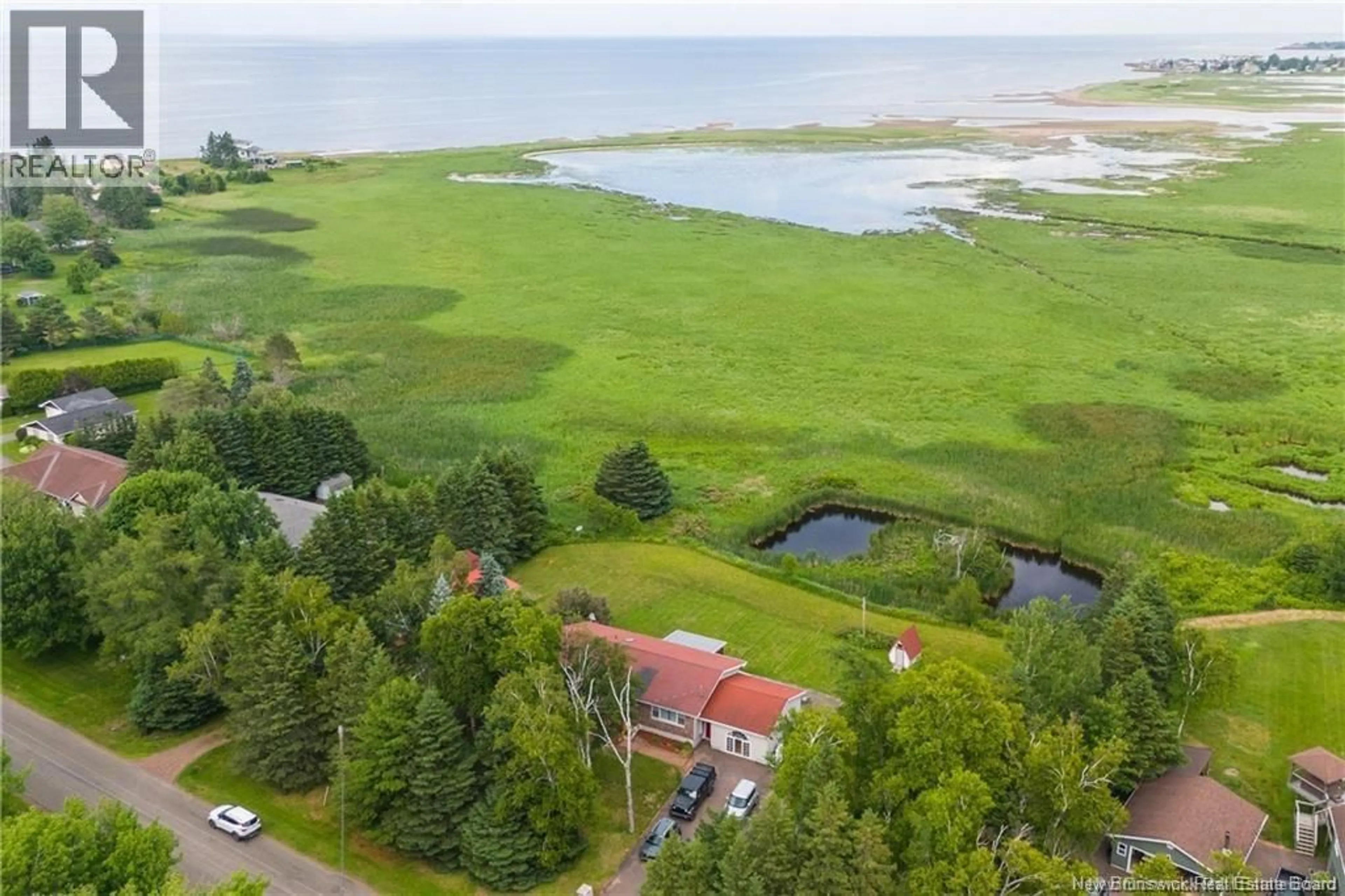 A pic from outside/outdoor area/front of a property/back of a property/a pic from drone, water/lake/river/ocean view for 75 CAP BRULE, Boudreau New Brunswick E4P6H8