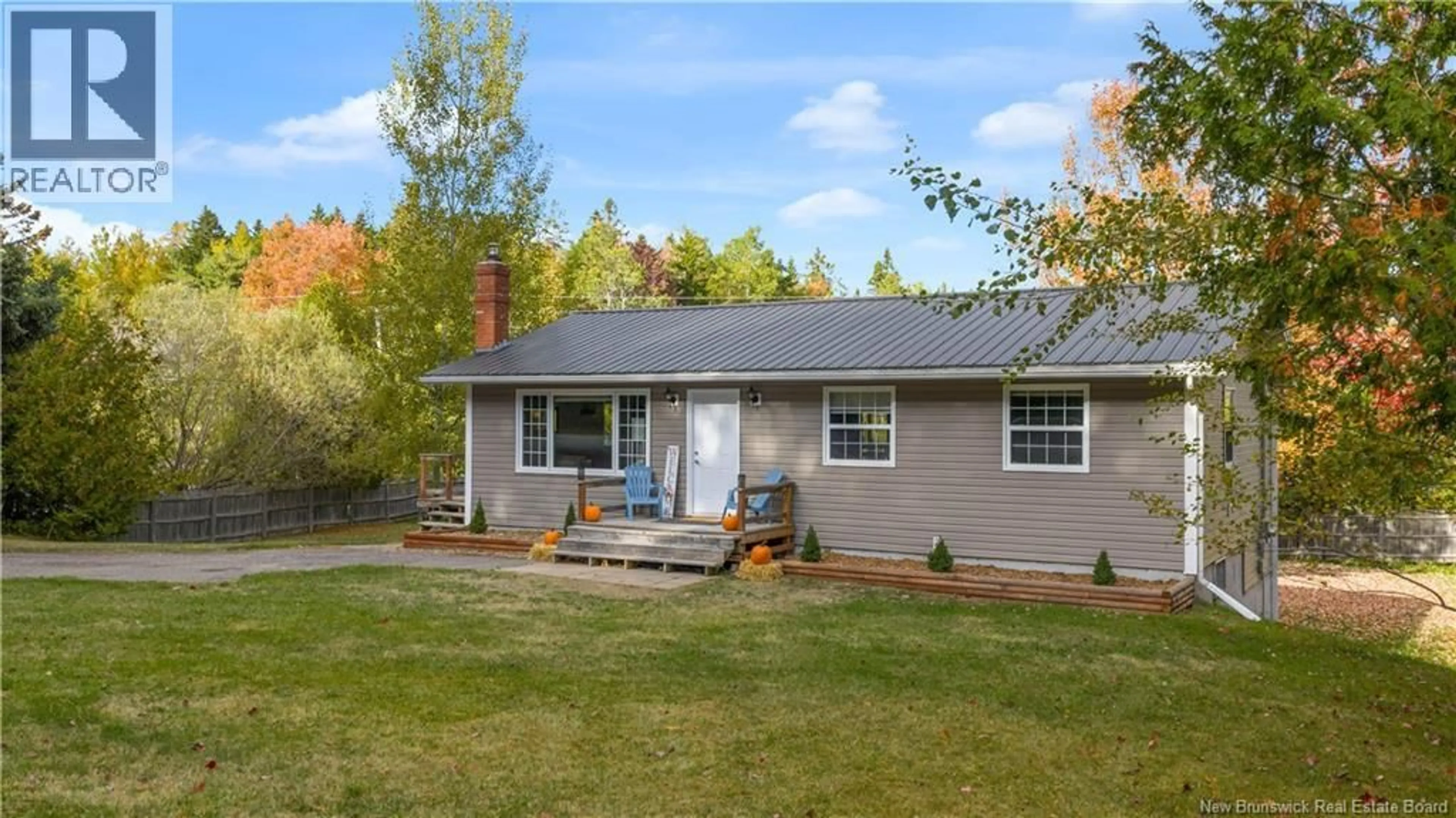Home with vinyl exterior material, street for 1 WOODRIDGE DRIVE, Quispamsis New Brunswick E2G1A2