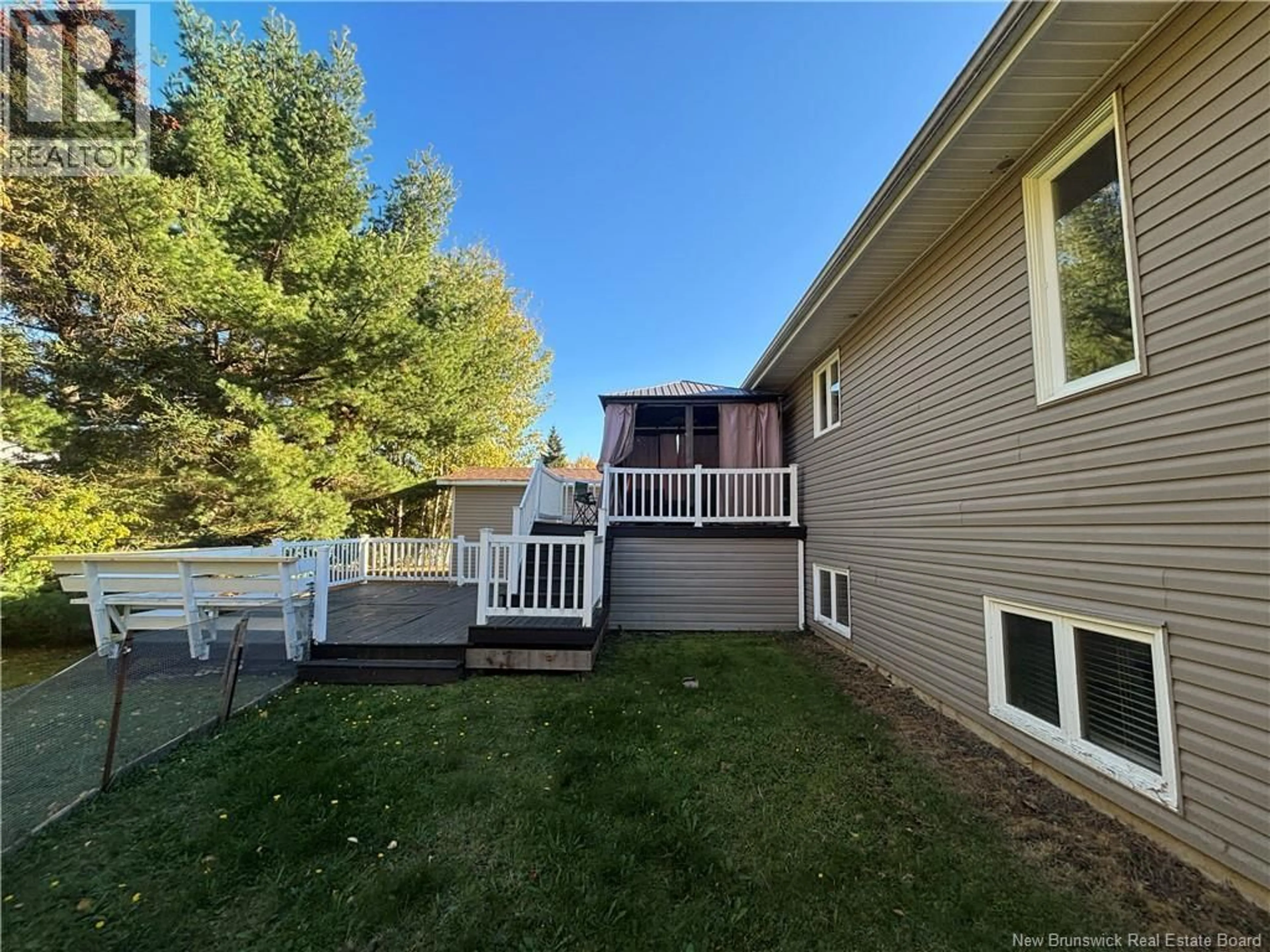 Home with vinyl exterior material, unknown for 1027 RUE HACHE, Beresford New Brunswick E8K1H9