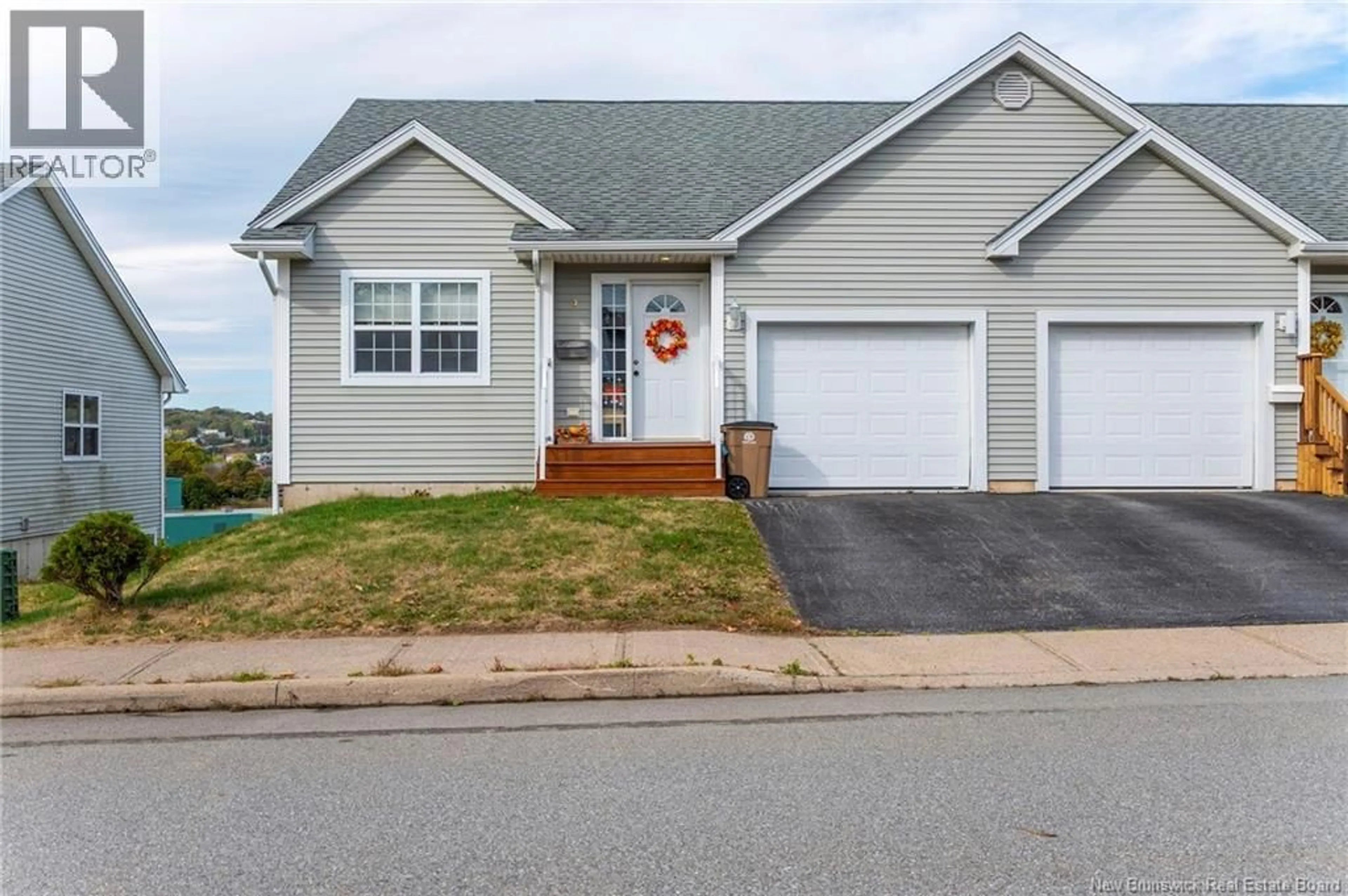 Home with vinyl exterior material, street for 9 GRAHAM STREET, Saint John New Brunswick E2J5A3