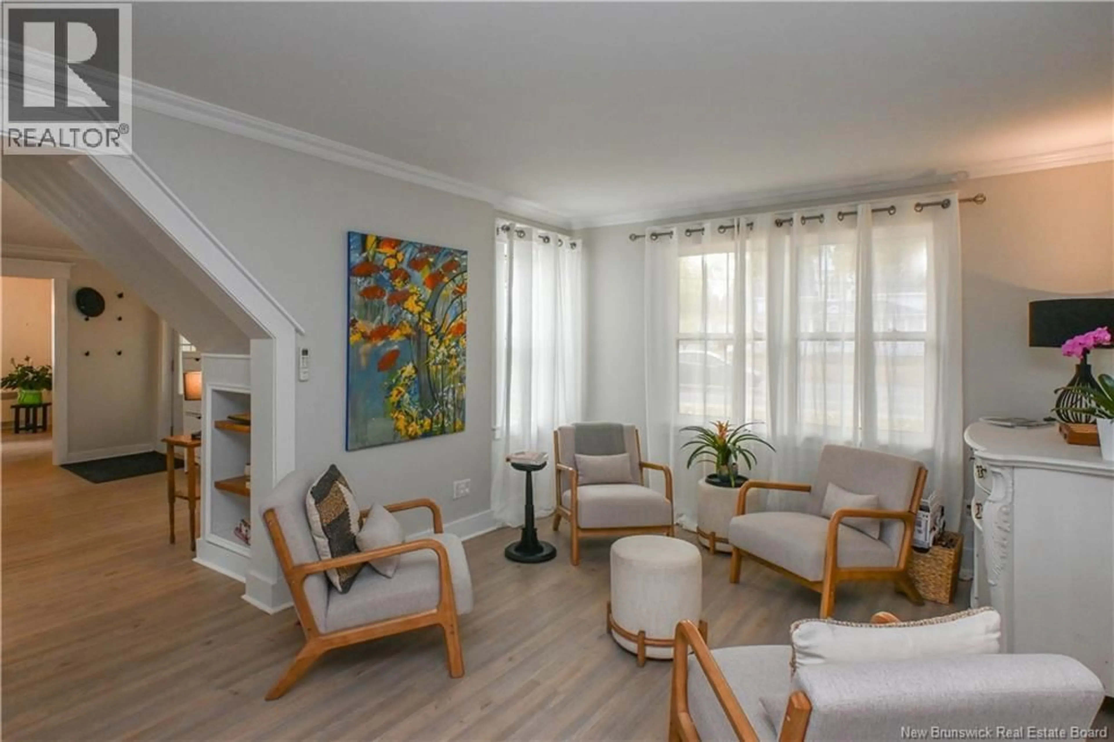 Living room with furniture, wood/laminate floor for 309 SAINT-PIERRE O BOULEVARD, Caraquet New Brunswick E1W1A3