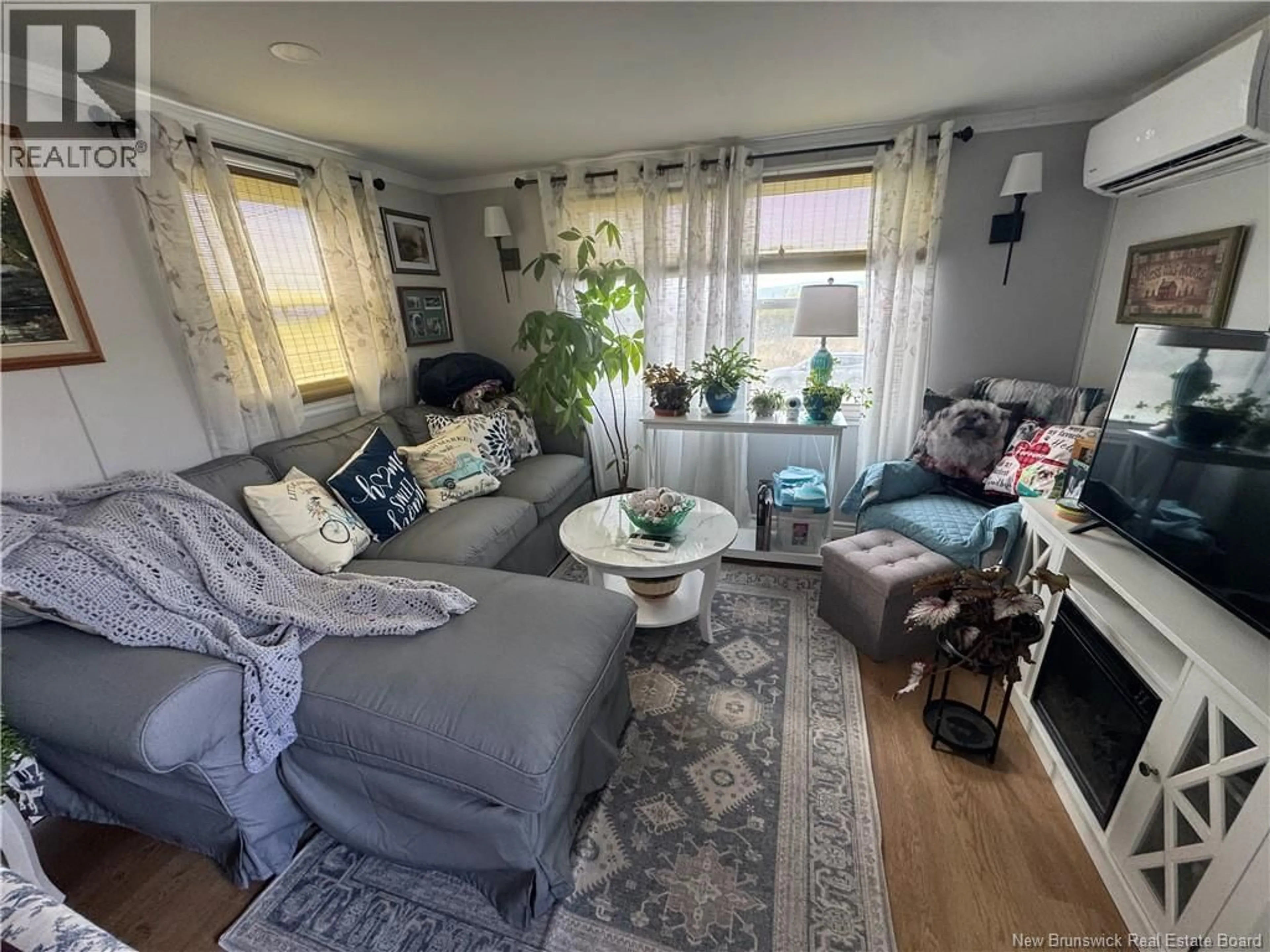 Living room with furniture, unknown for 7 FIRST STREET, Hampton New Brunswick E5N5T3