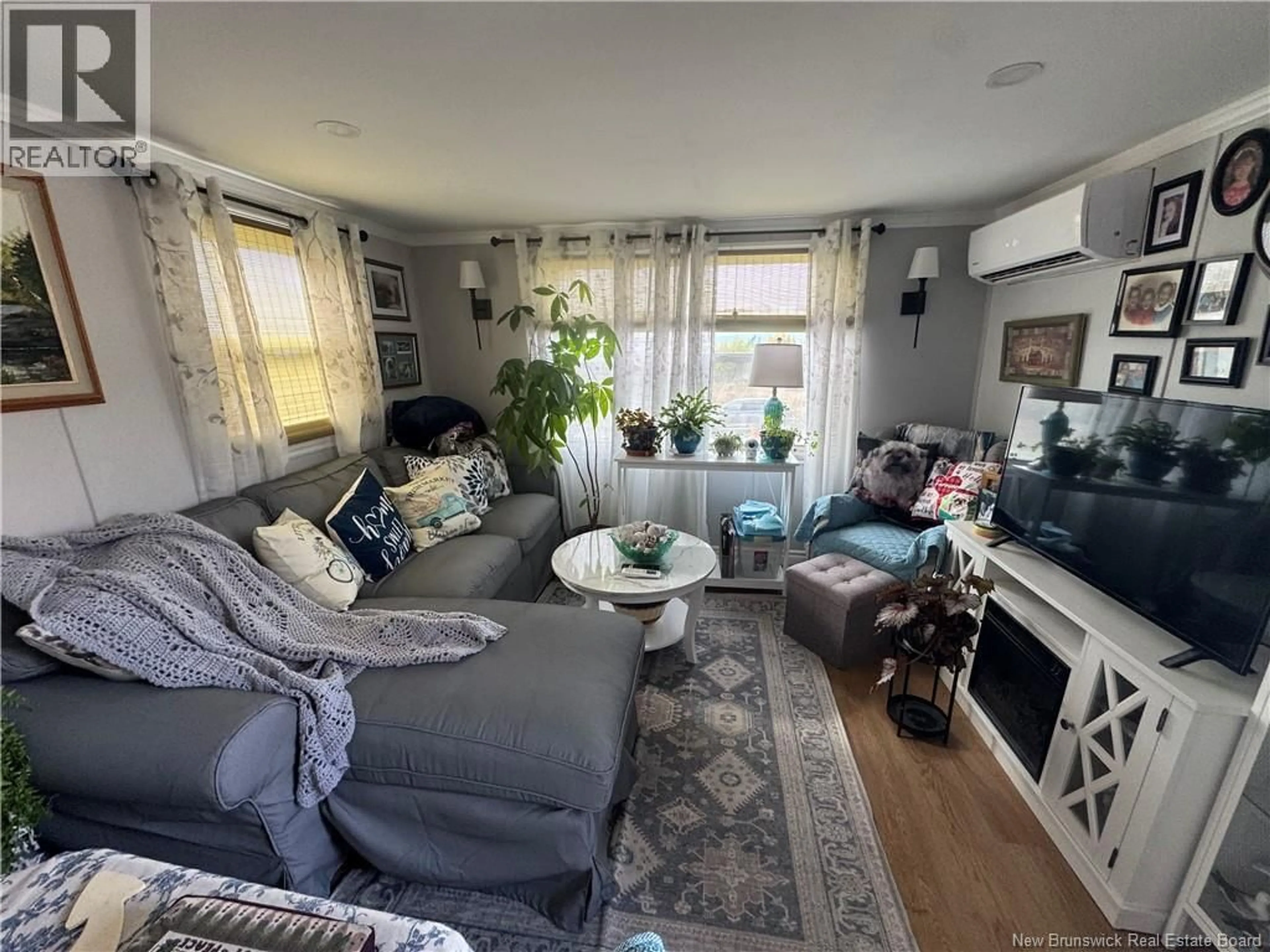 Living room with furniture, unknown for 7 FIRST STREET, Hampton New Brunswick E5N5T3