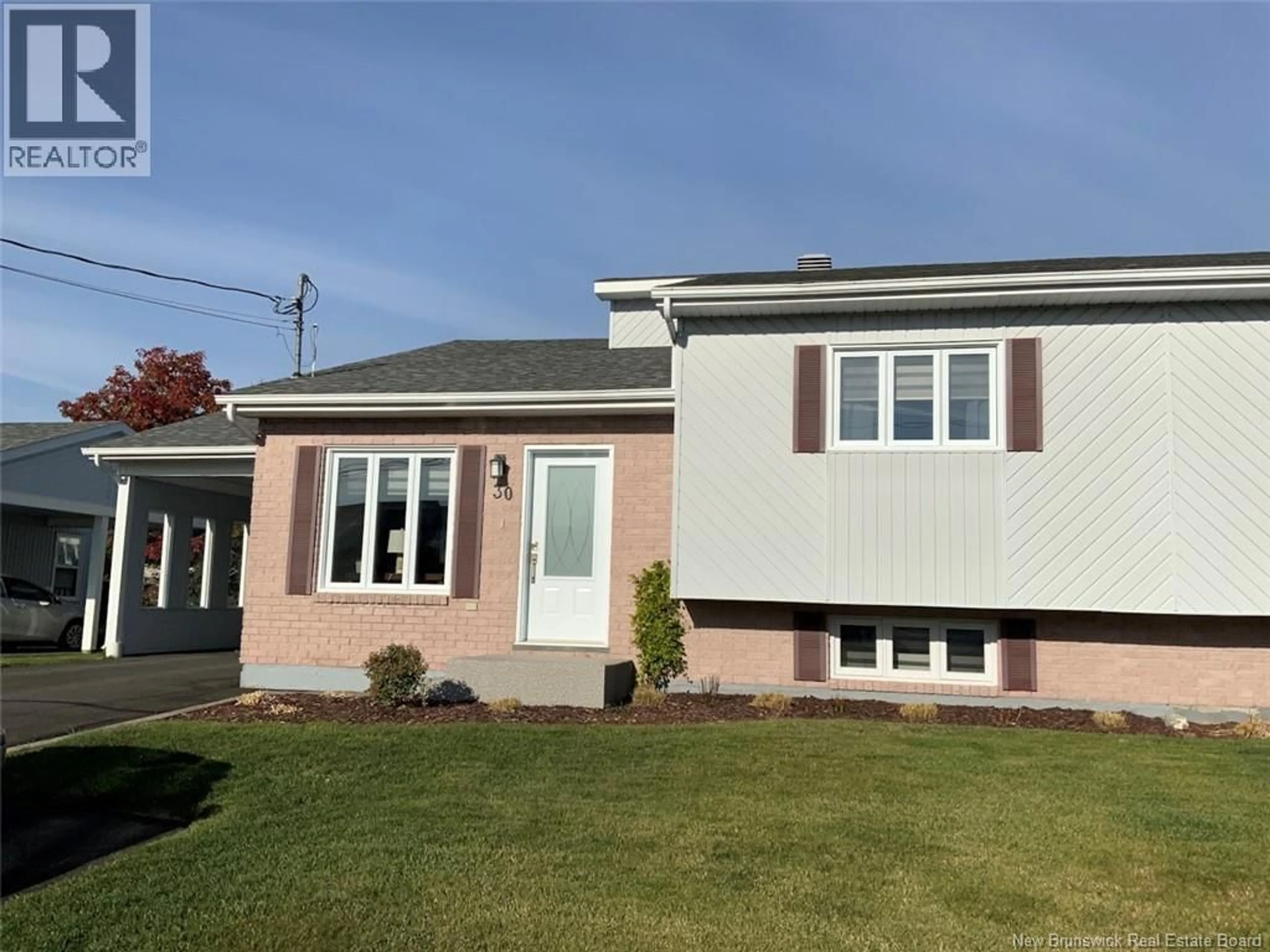 Home with vinyl exterior material, street for 30 DR. GAUDREAU AVENUE, Edmundston New Brunswick E3V4B9
