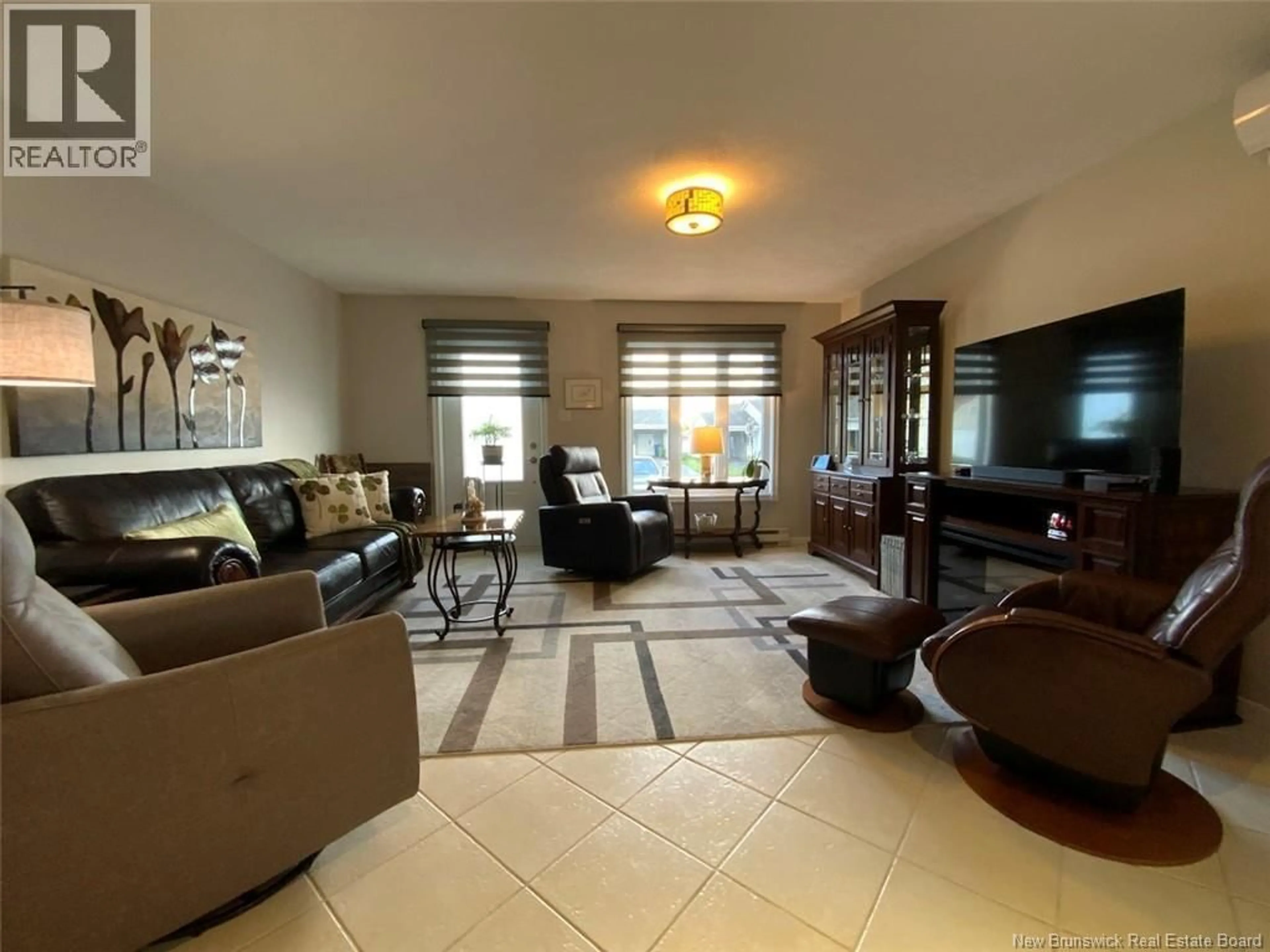 Living room with furniture, unknown for 30 DR. GAUDREAU AVENUE, Edmundston New Brunswick E3V4B9