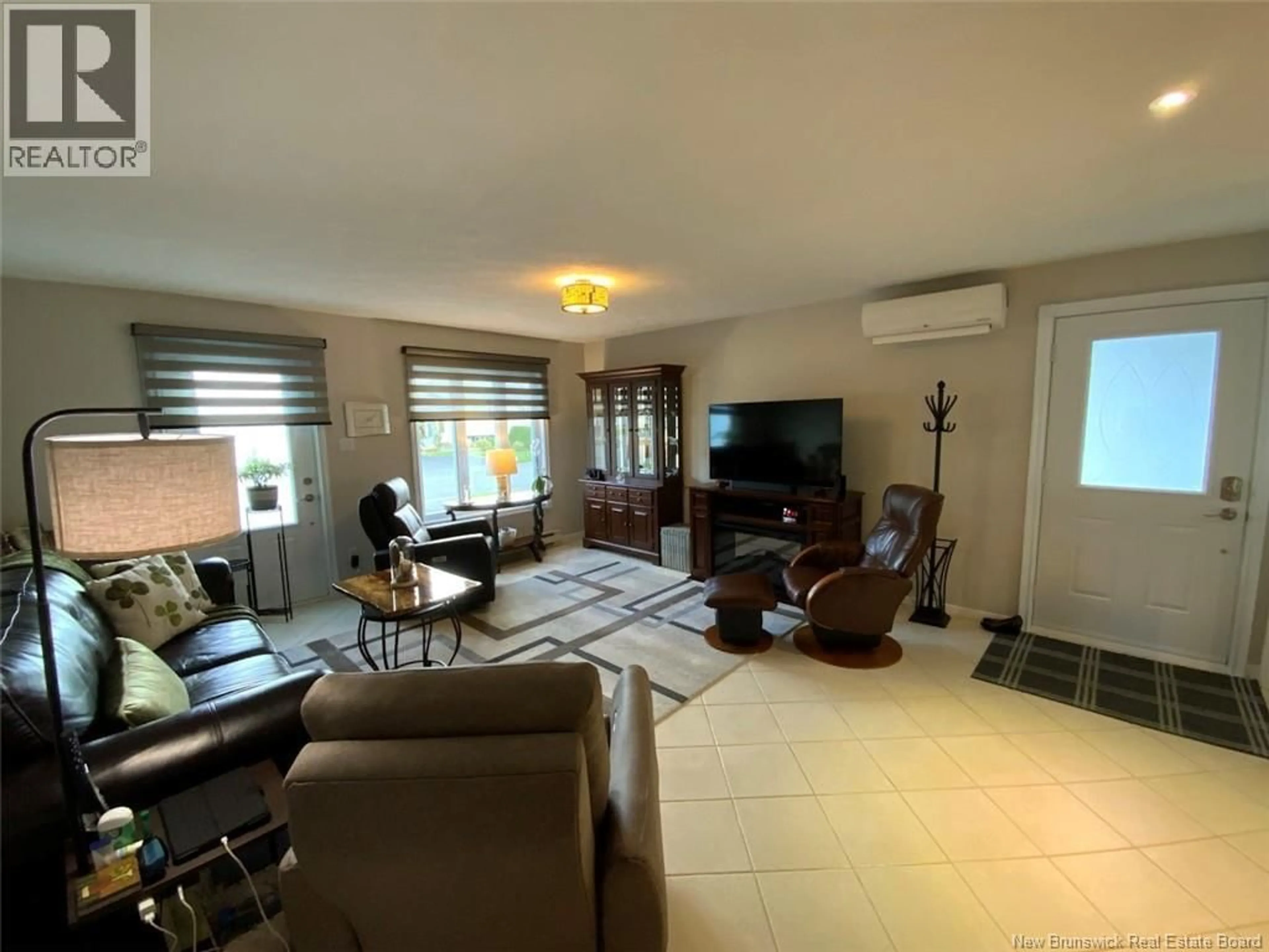 Living room with furniture, unknown for 30 DR. GAUDREAU AVENUE, Edmundston New Brunswick E3V4B9