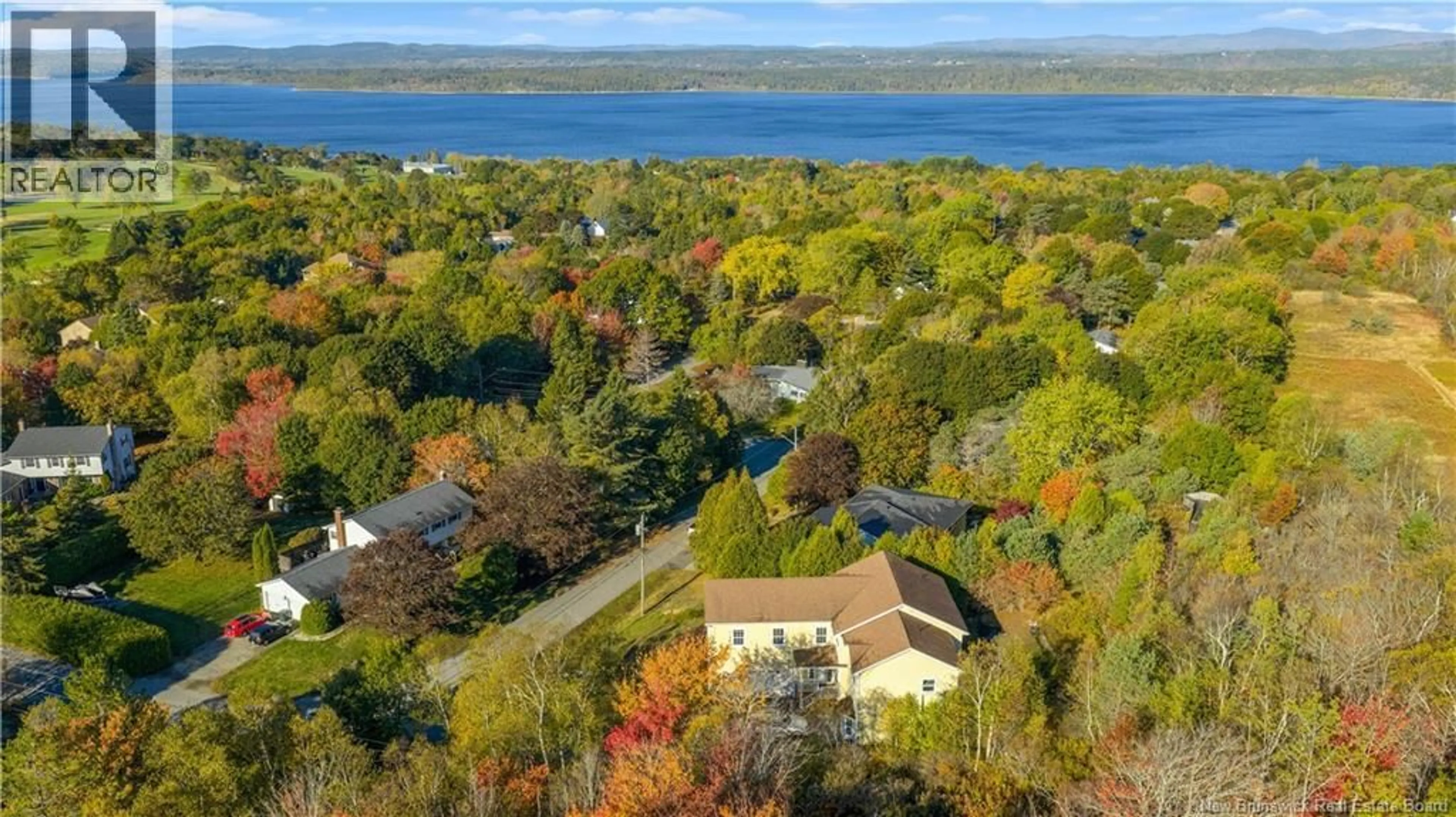 A pic from outside/outdoor area/front of a property/back of a property/a pic from drone, water/lake/river/ocean view for 119 BIRCH CRESCENT, Rothesay New Brunswick E2H1W3