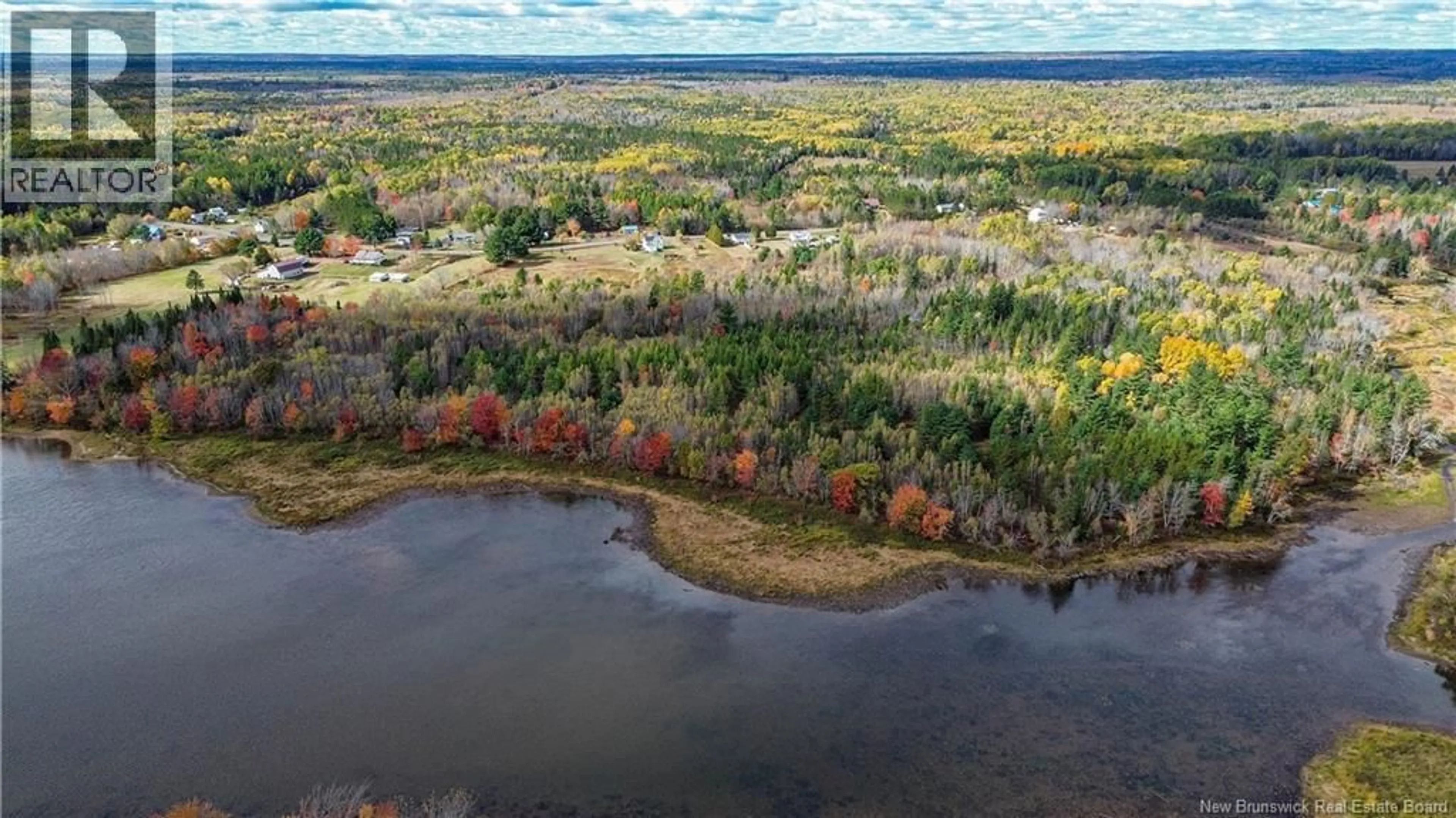A pic from outside/outdoor area/front of a property/back of a property/a pic from drone, water/lake/river/ocean view for 136 LILLOETT DRIVE, Chipman New Brunswick E4A1V7