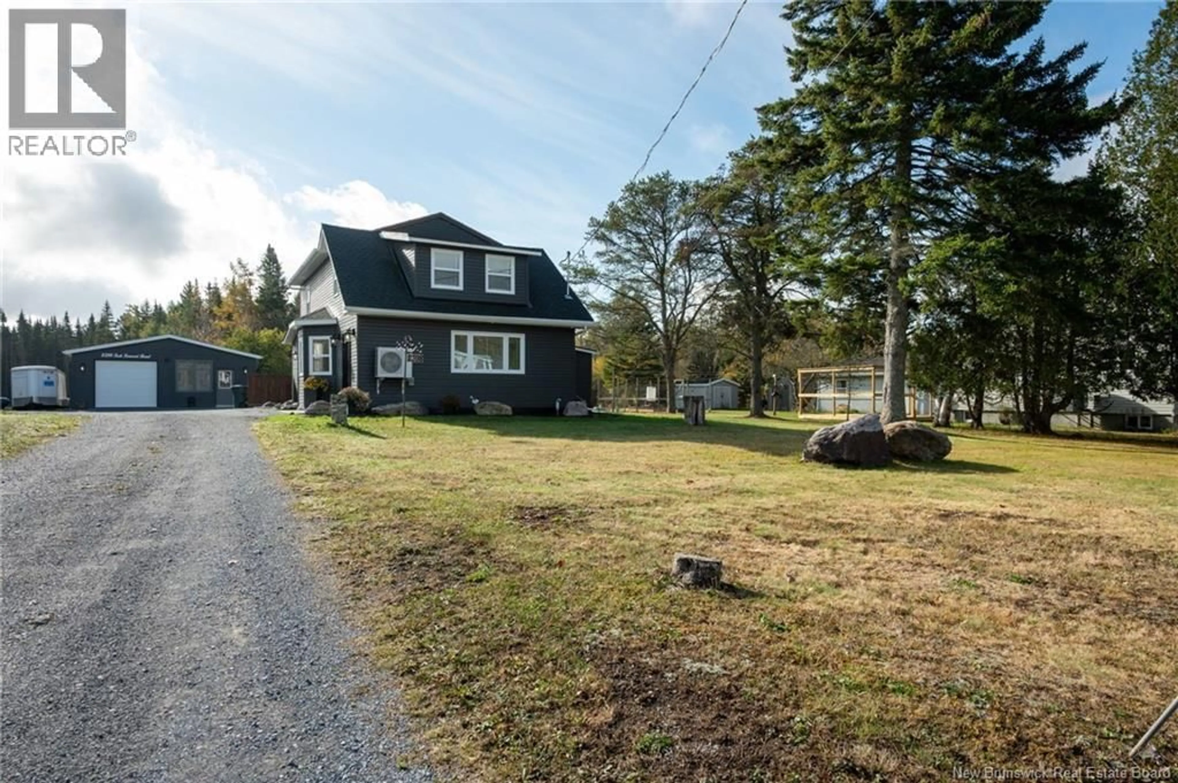 A pic from outside/outdoor area/front of a property/back of a property/a pic from drone, street for 2398 LOCH LOMOND ROAD, Saint John New Brunswick E2N1A4