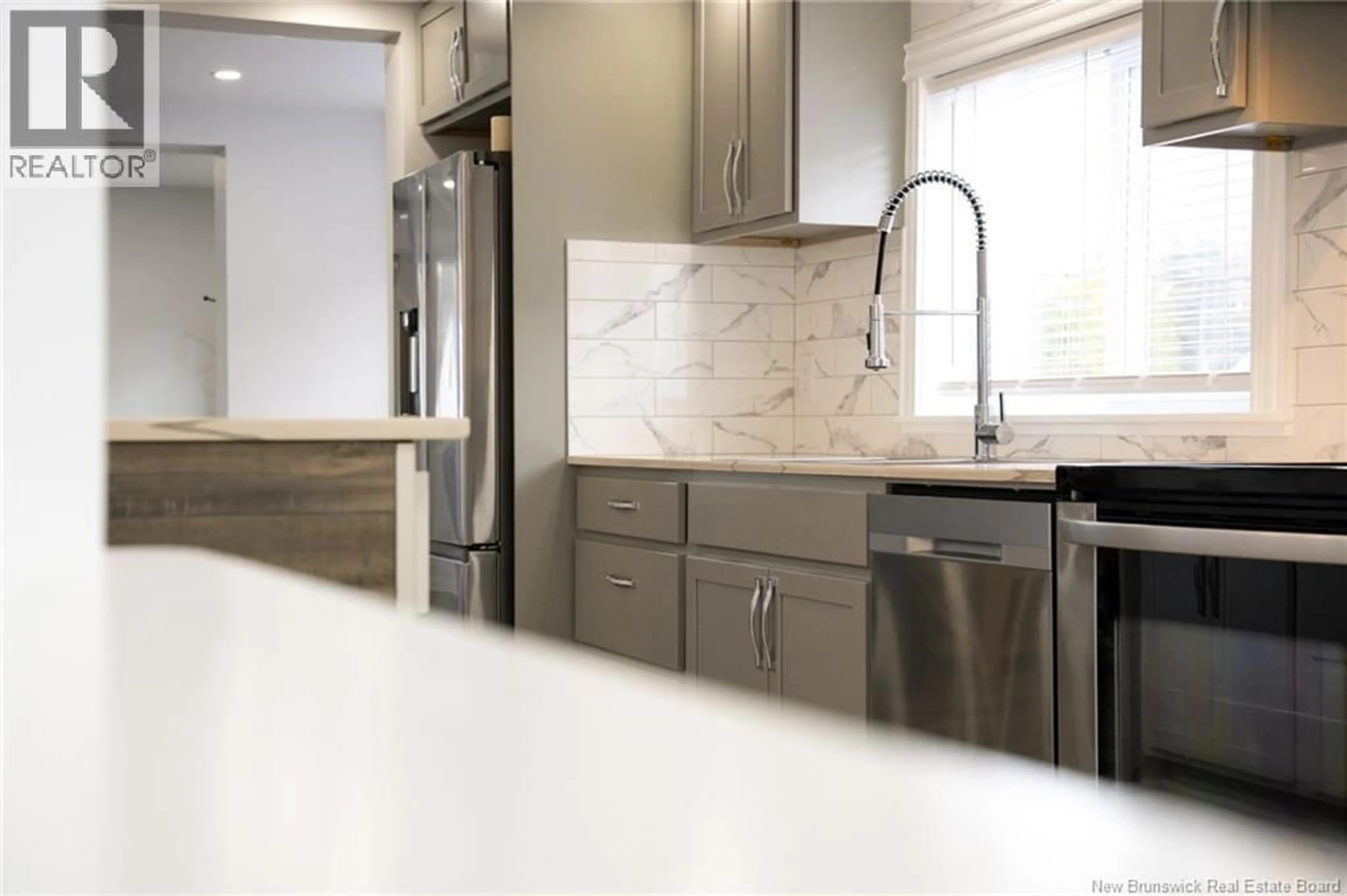 Open concept kitchen, ceramic/tile floor for 2398 LOCH LOMOND ROAD, Saint John New Brunswick E2N1A4