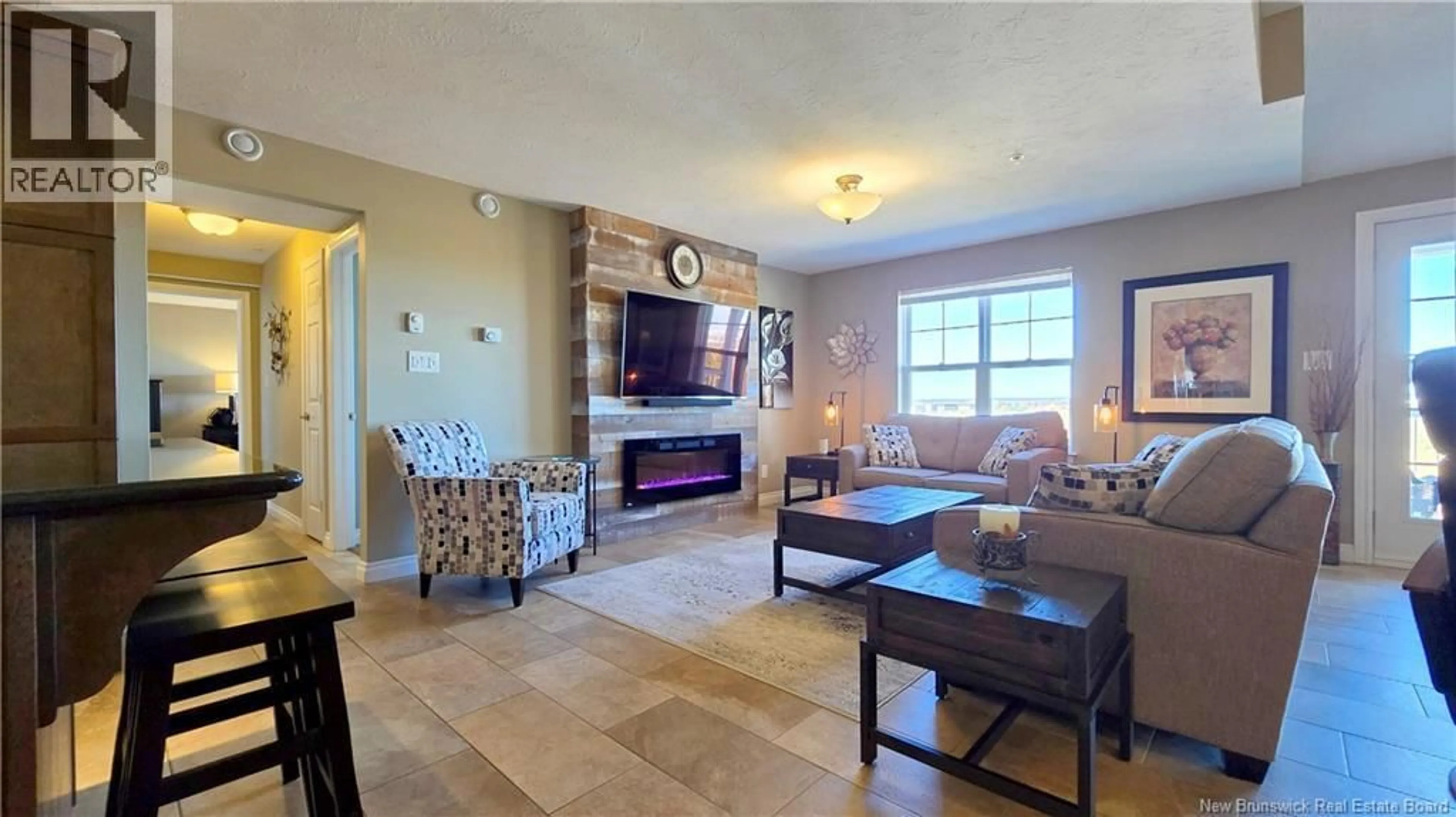 Living room with furniture, ceramic/tile floor for 403 - 208 COVERDALE ROAD, Riverview New Brunswick E1B3J6