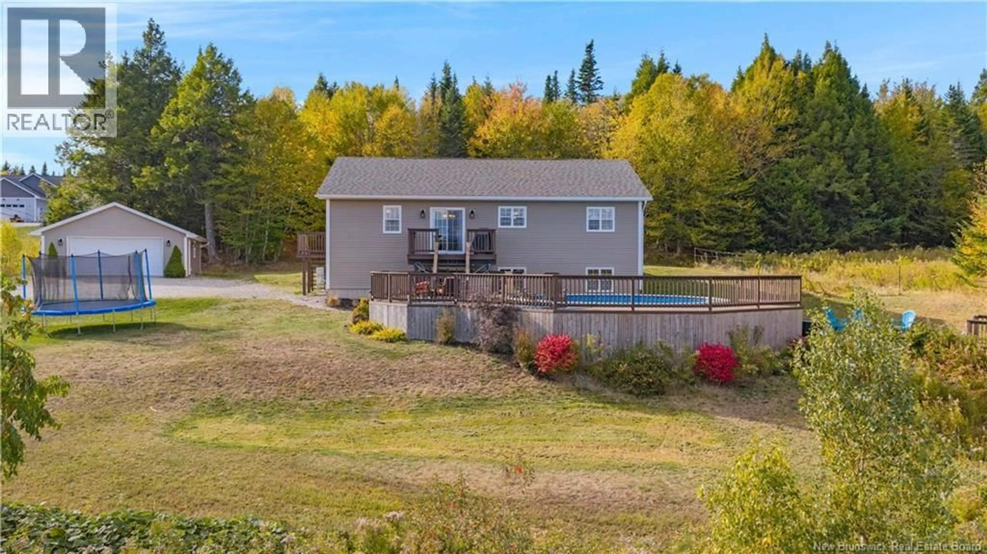 A pic from outside/outdoor area/front of a property/back of a property/a pic from drone, water/lake/river/ocean view for 21 BETH LANE, Nauwigewauk New Brunswick E5N0C4
