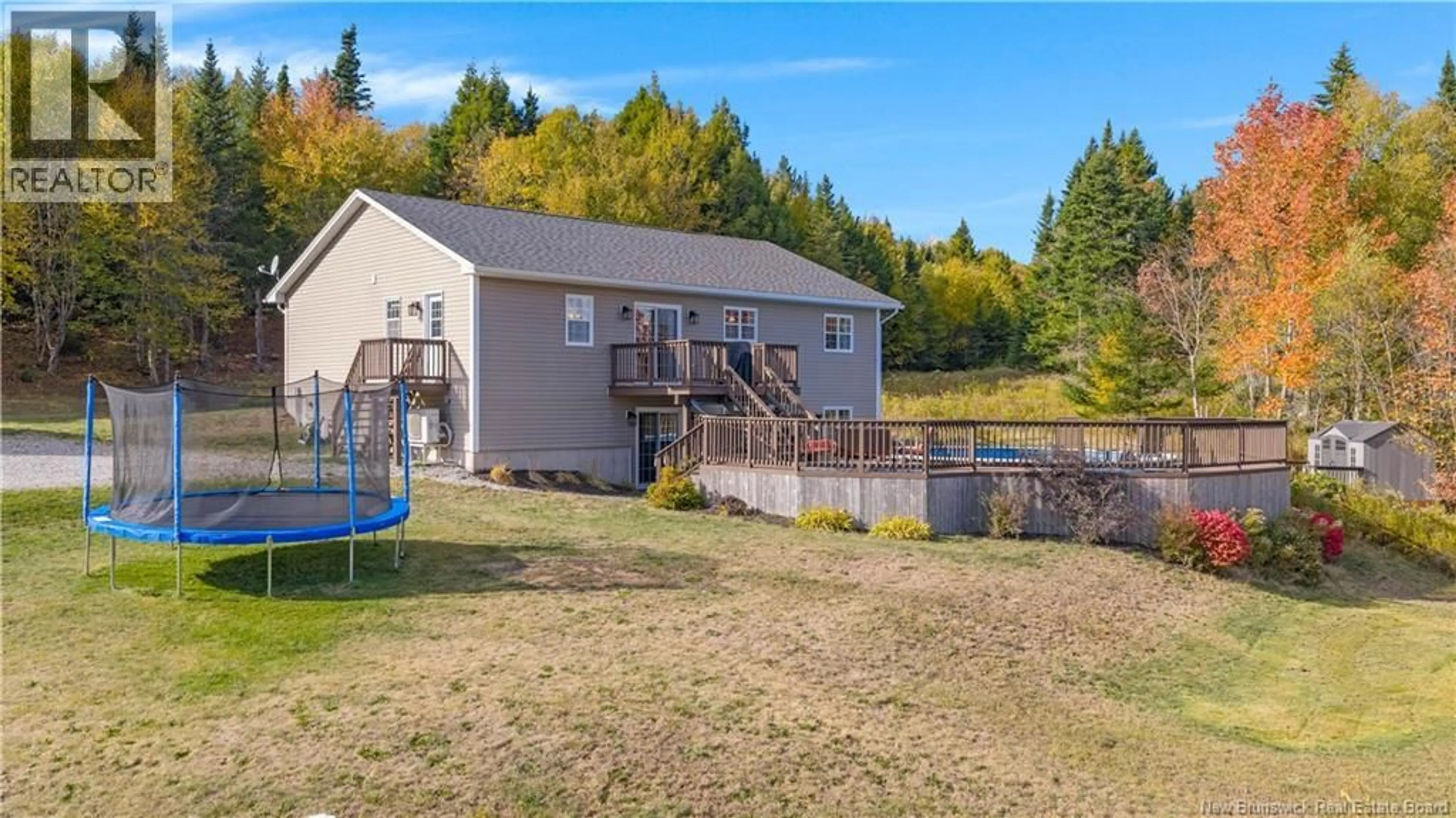 A pic from outside/outdoor area/front of a property/back of a property/a pic from drone, water/lake/river/ocean view for 21 BETH LANE, Nauwigewauk New Brunswick E5N0C4