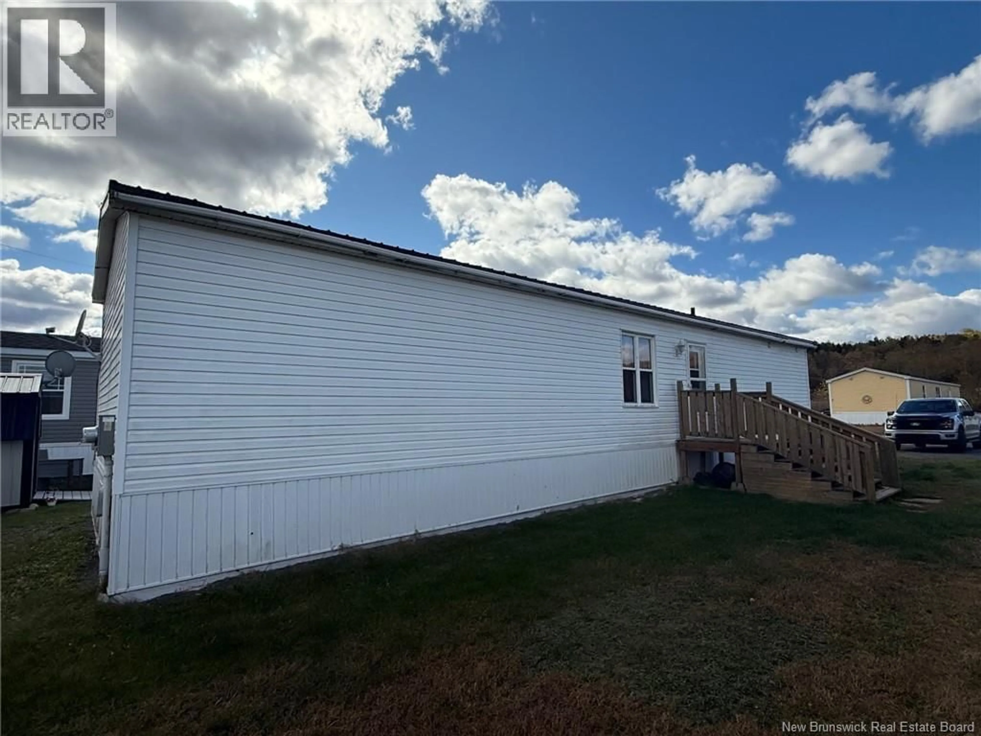 Home with vinyl exterior material, building for 15 IVORY COURT, Woodstock New Brunswick E7M0G5