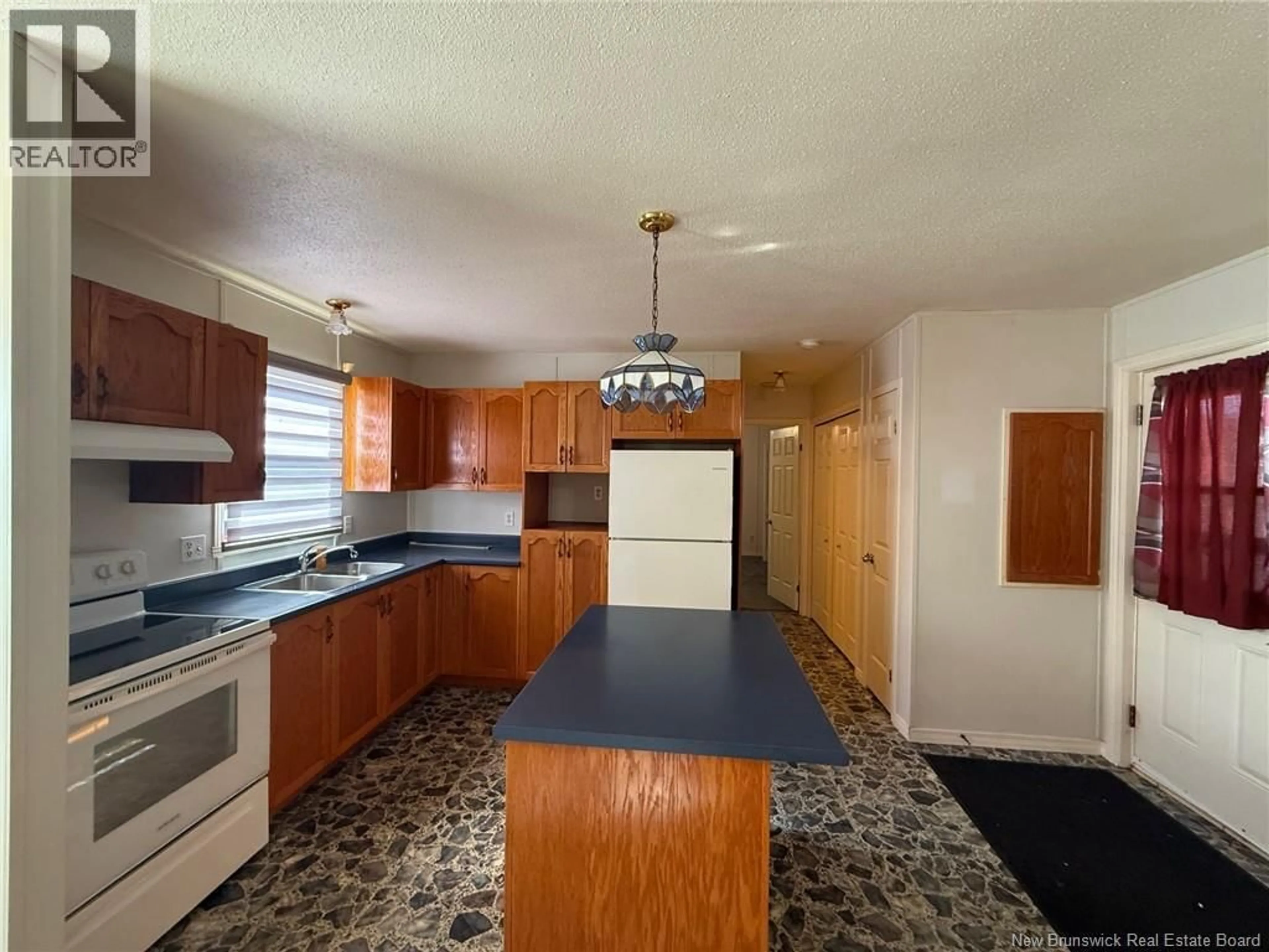 Open concept kitchen, unknown for 15 IVORY COURT, Woodstock New Brunswick E7M0G5