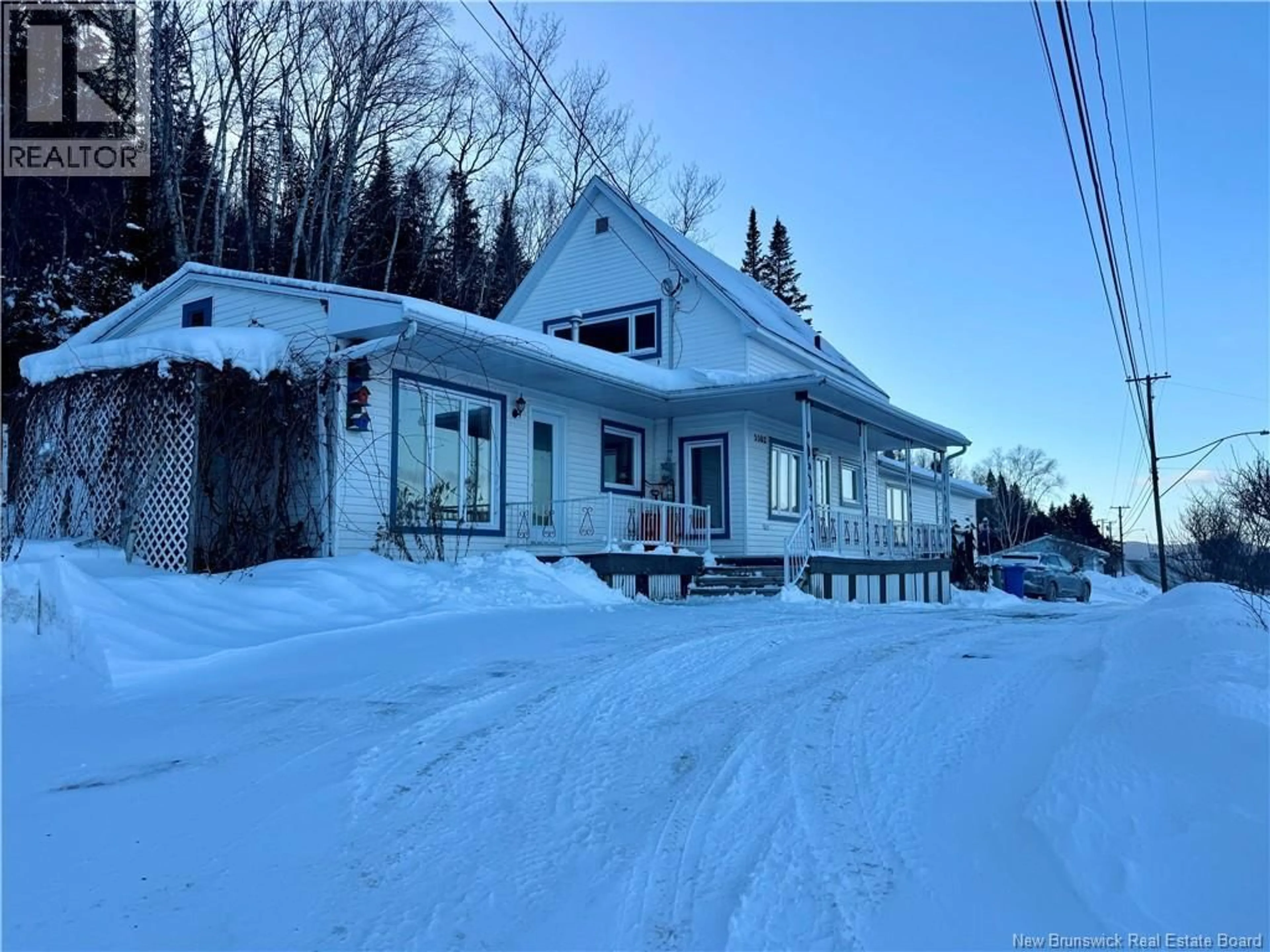 A pic from outside/outdoor area/front of a property/back of a property/a pic from drone, street for 5502 CENTRALE STREET, Lac Baker New Brunswick E7A1H7