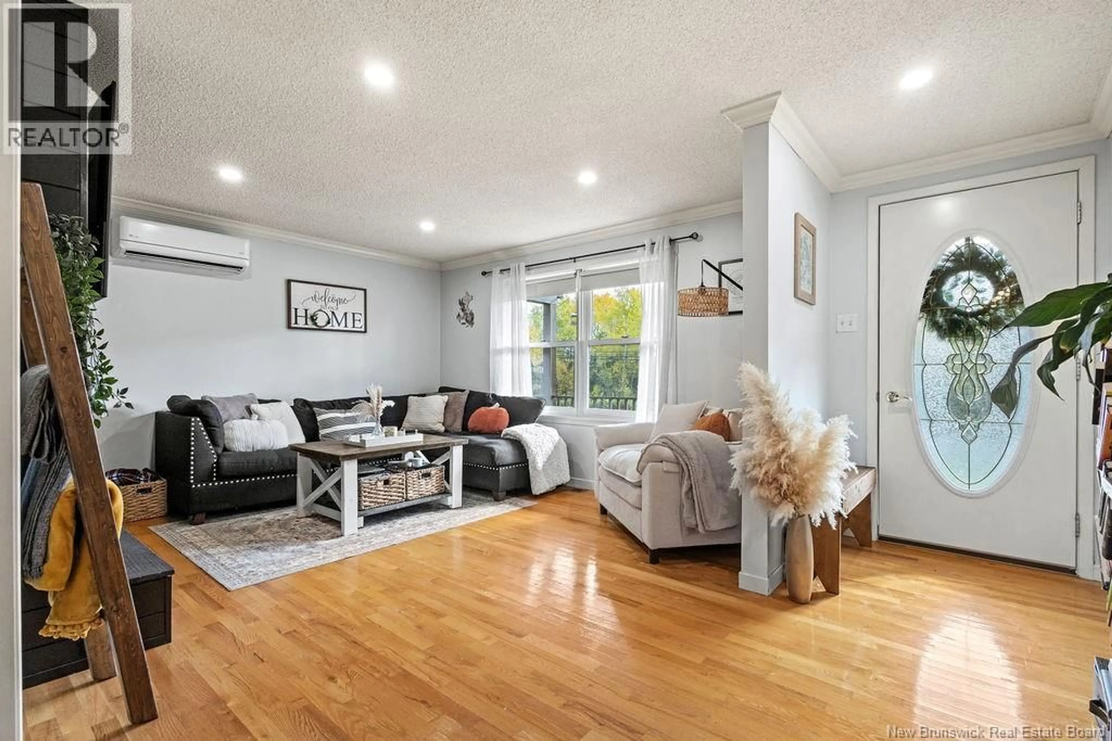 Living room with furniture, wood/laminate floor for 4815 108 ROUTE, Derby New Brunswick E1V5C2