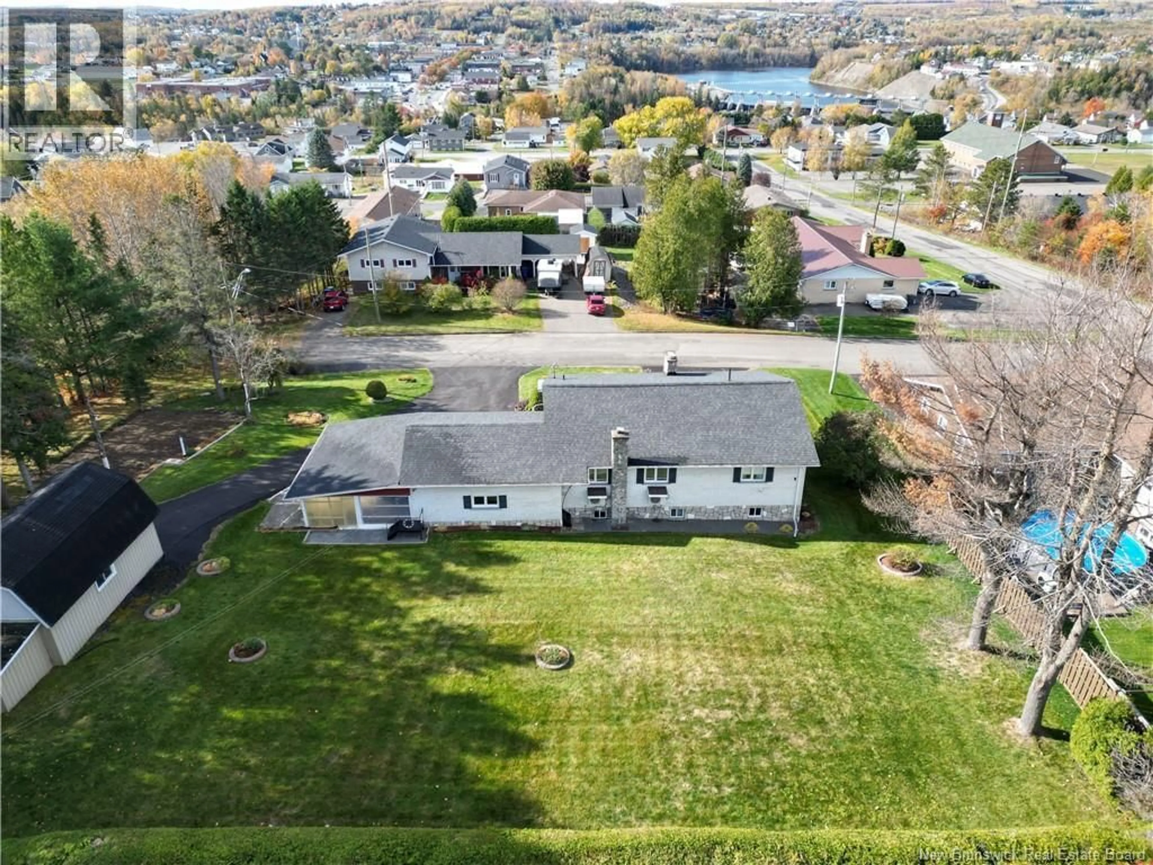 A pic from outside/outdoor area/front of a property/back of a property/a pic from drone, water/lake/river/ocean view for 198 BELLEVUE STREET, Grand Falls New Brunswick E3Y1C2