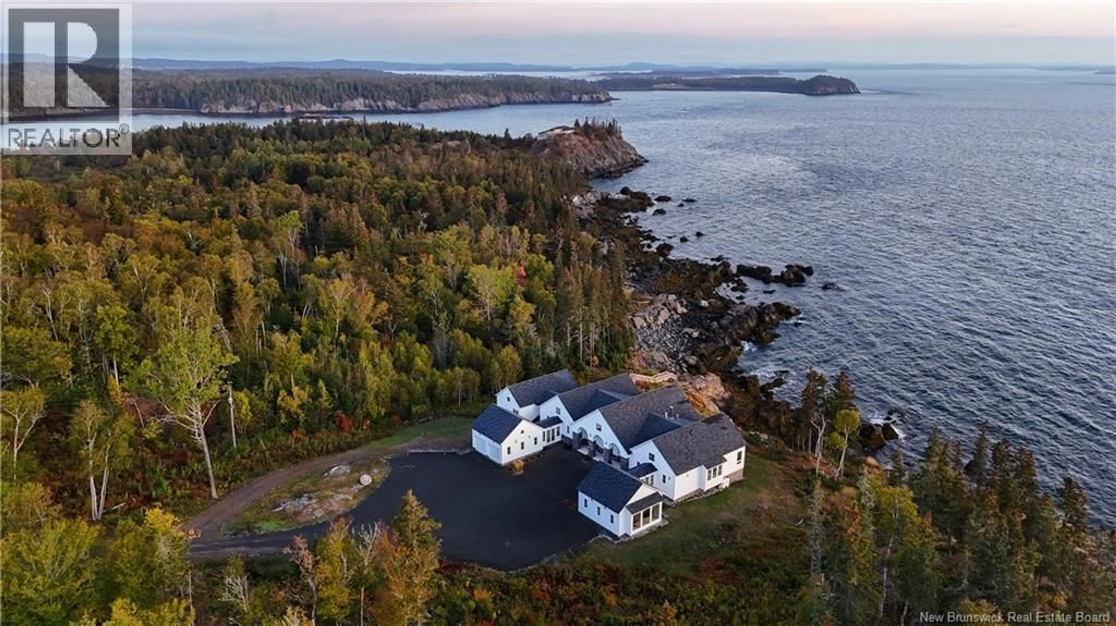 A pic from outside/outdoor area/front of a property/back of a property/a pic from drone, water/lake/river/ocean view for 868 FUNDY DRIVE, Wilsons Beach New Brunswick E5E1X5