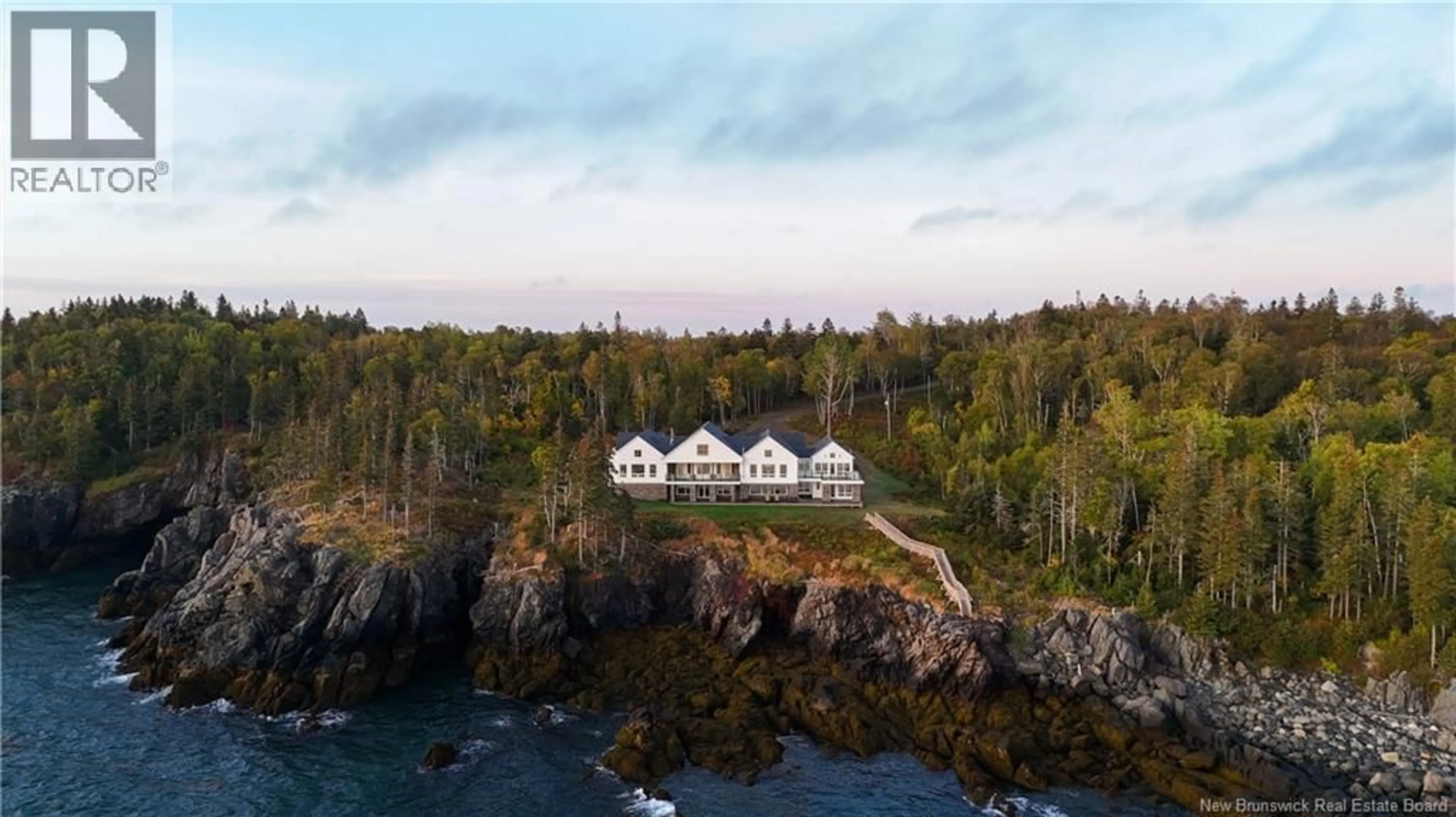A pic from outside/outdoor area/front of a property/back of a property/a pic from drone, water/lake/river/ocean view for 868 FUNDY DRIVE, Wilsons Beach New Brunswick E5E1X5