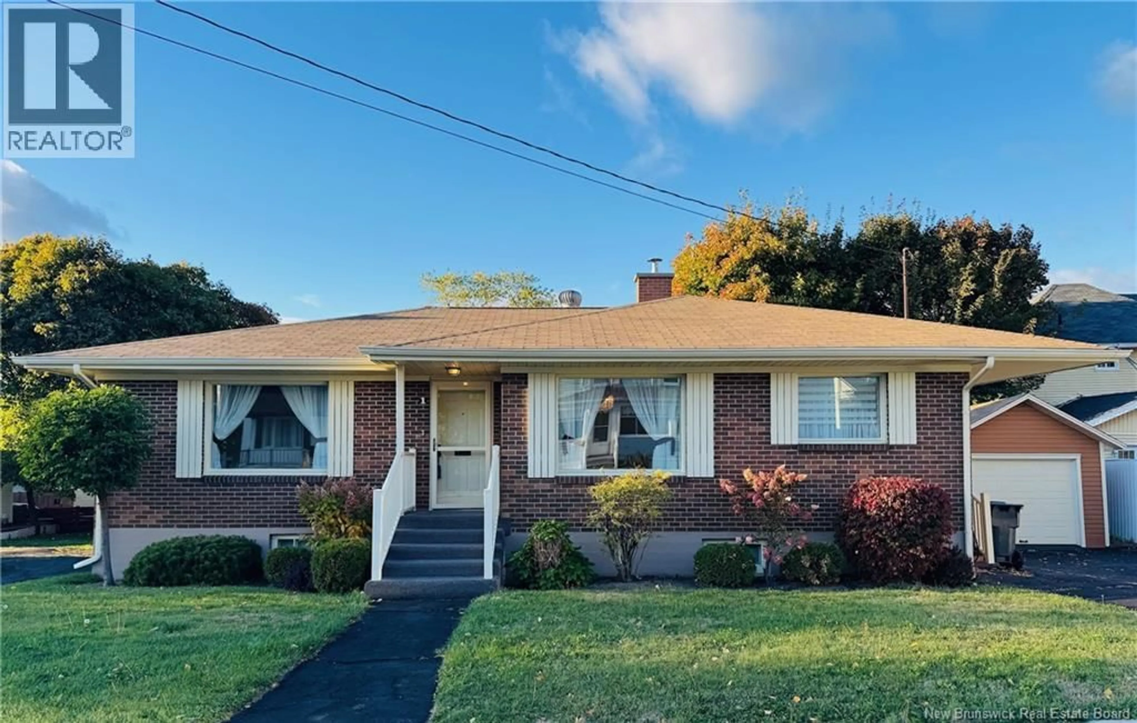 Home with vinyl exterior material, street for 1 WELLINGTON STREET, Campbellton New Brunswick E3N1G1