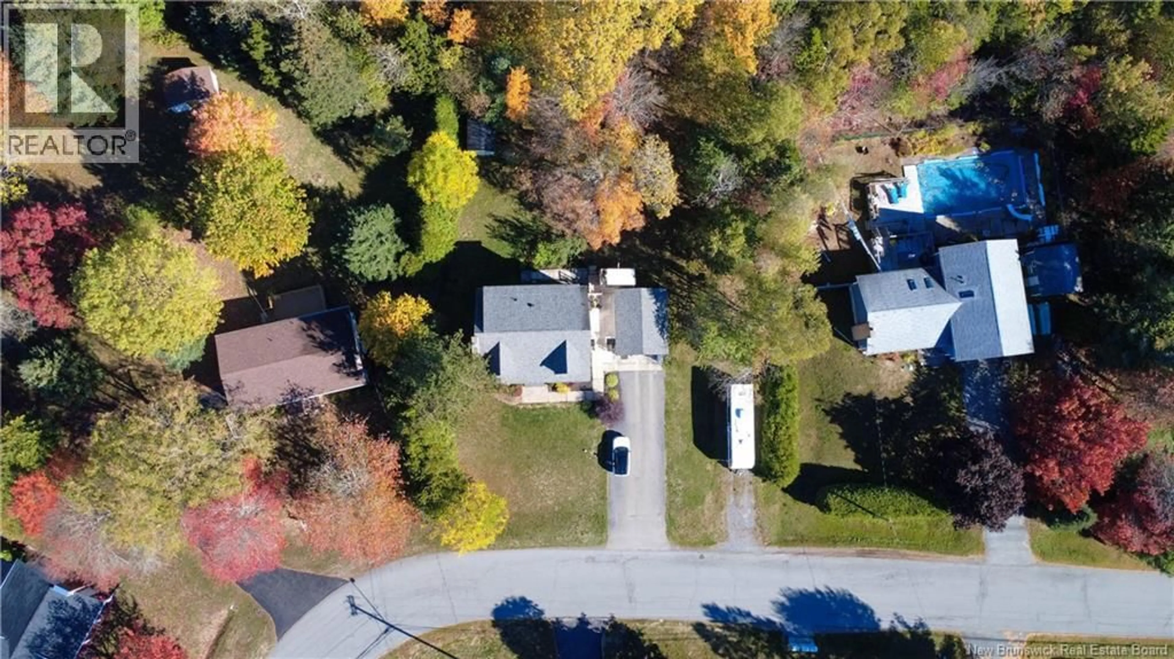 A pic from outside/outdoor area/front of a property/back of a property/a pic from drone, street for 14 LONGWOOD DRIVE, Quispamsis New Brunswick E2E2S7