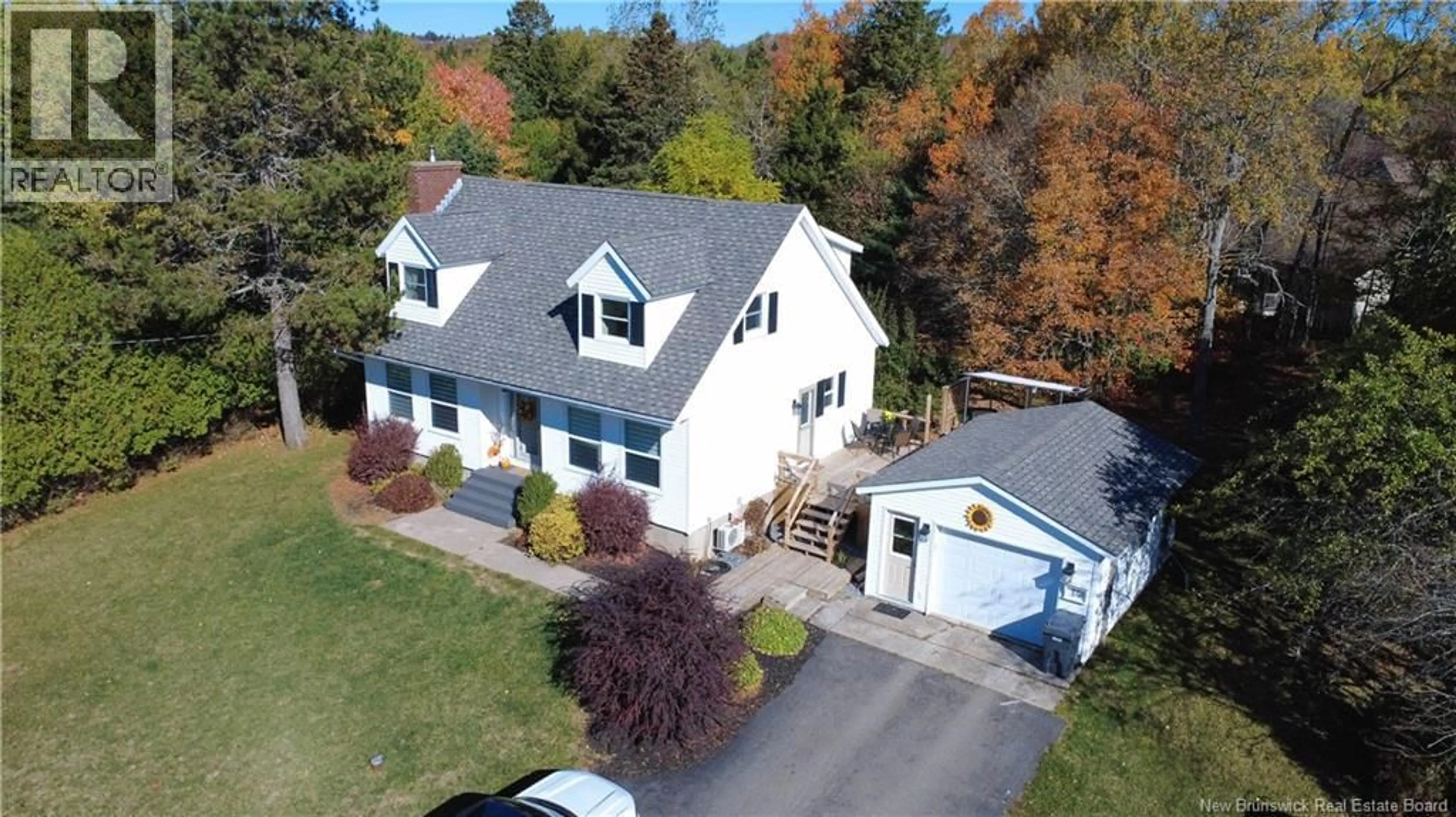 A pic from outside/outdoor area/front of a property/back of a property/a pic from drone, street for 14 LONGWOOD DRIVE, Quispamsis New Brunswick E2E2S7