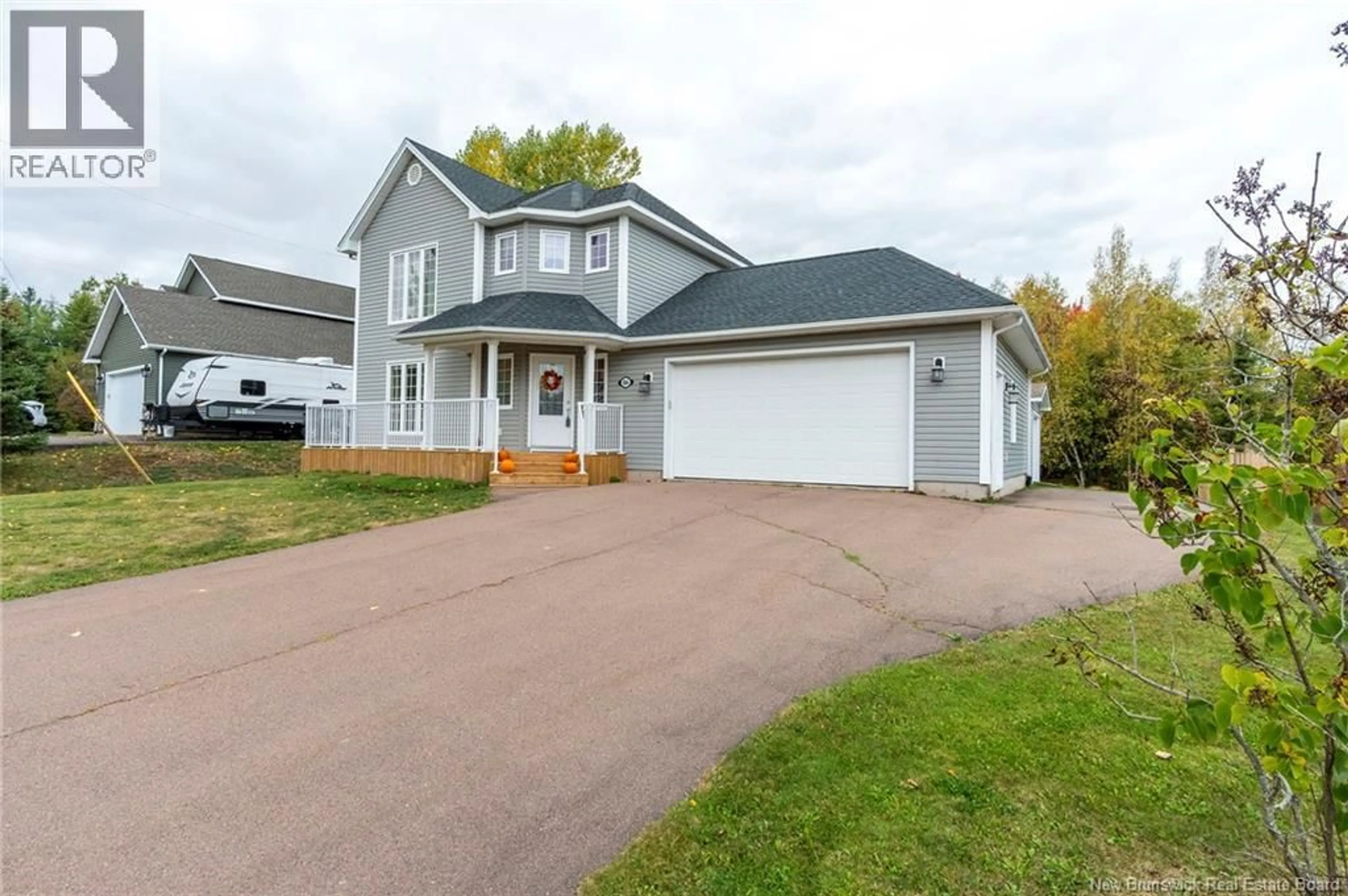 Home with vinyl exterior material, street for 86 MURIELLE CRESCENT, Dieppe New Brunswick E1A7R3