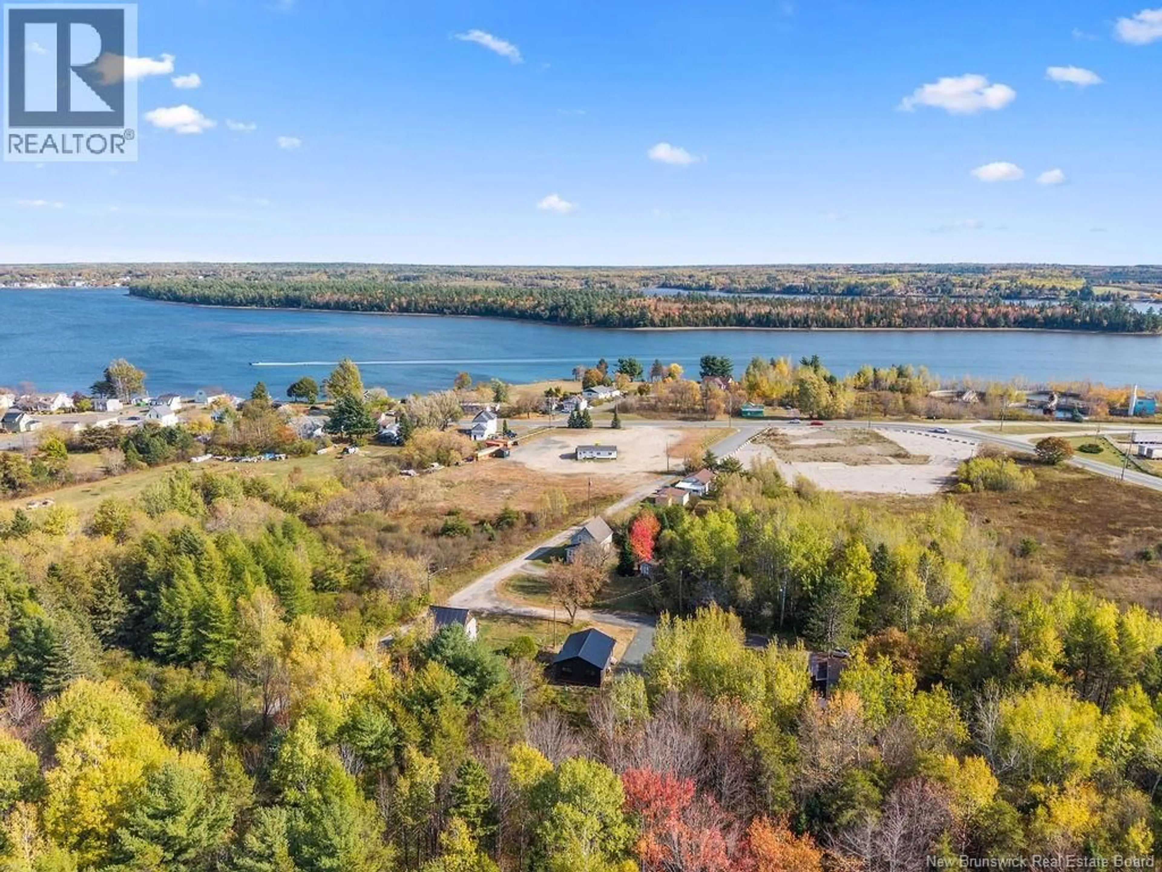 A pic from outside/outdoor area/front of a property/back of a property/a pic from drone, water/lake/river/ocean view for 261 ALLISON LANE, Miramichi New Brunswick E1V3C8