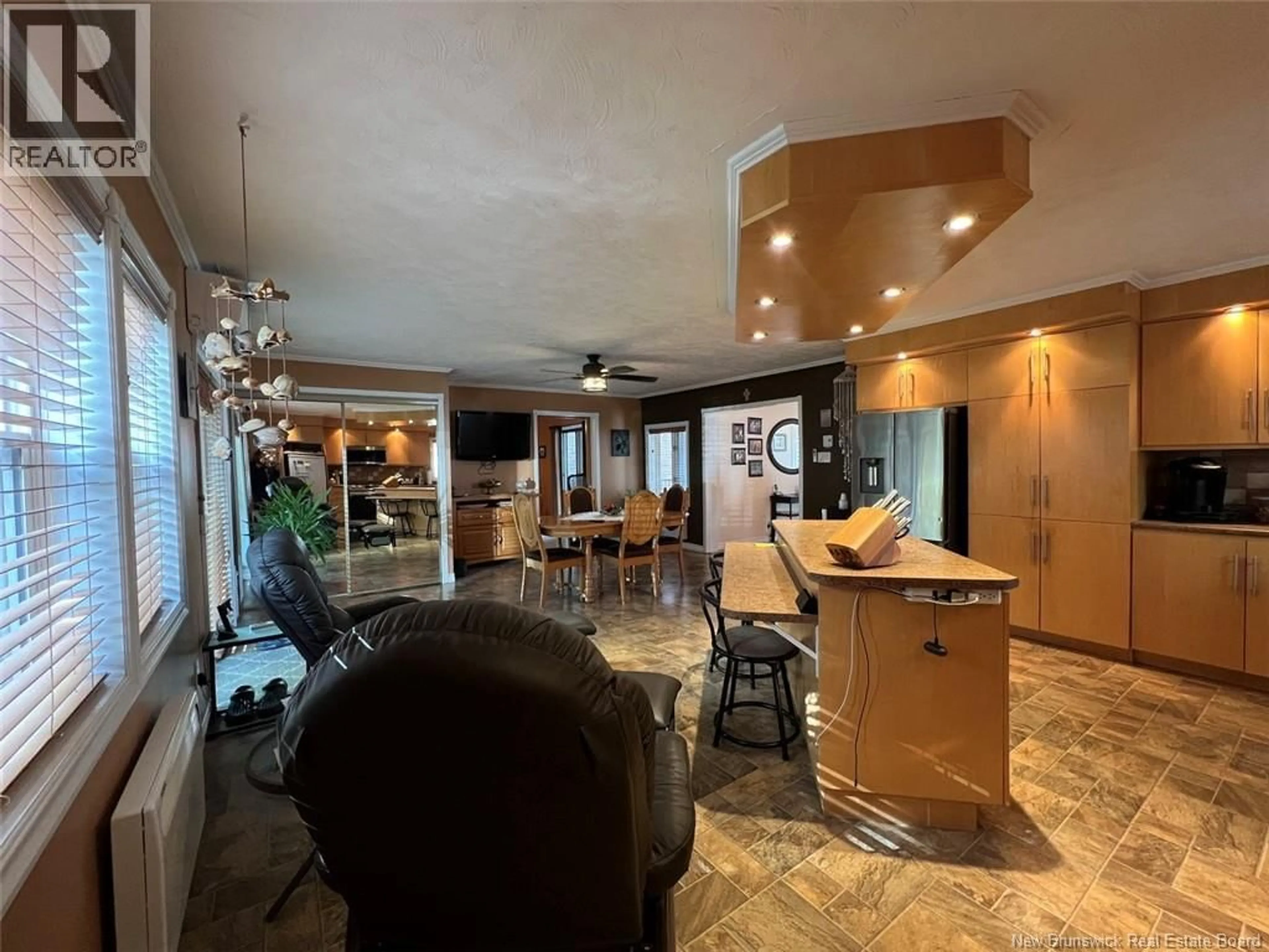 Open concept kitchen, ceramic/tile floor for 55 39TH AVENUE, Edmundston New Brunswick E3V2X1