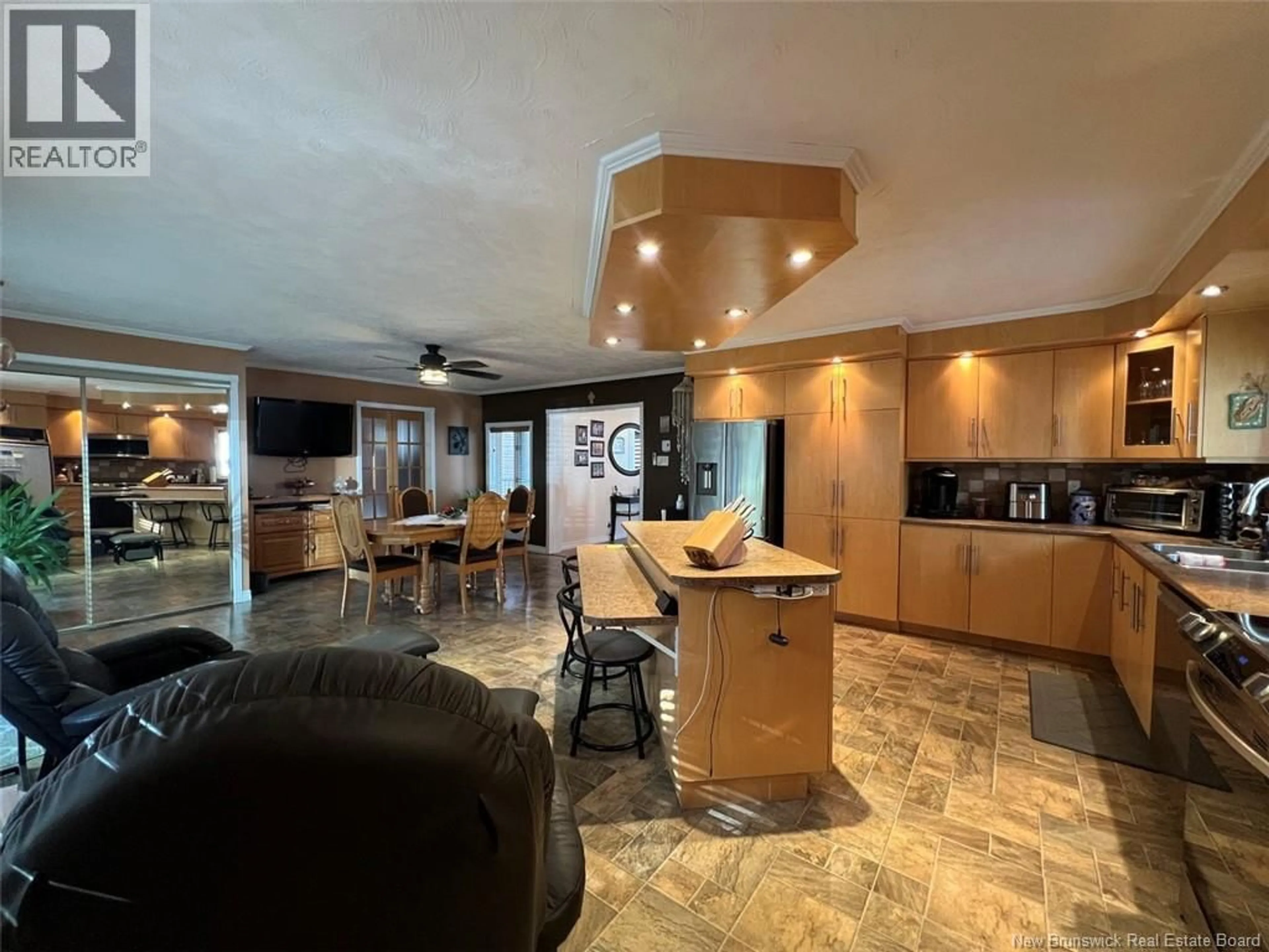 Open concept kitchen, ceramic/tile floor for 55 39TH AVENUE, Edmundston New Brunswick E3V2X1