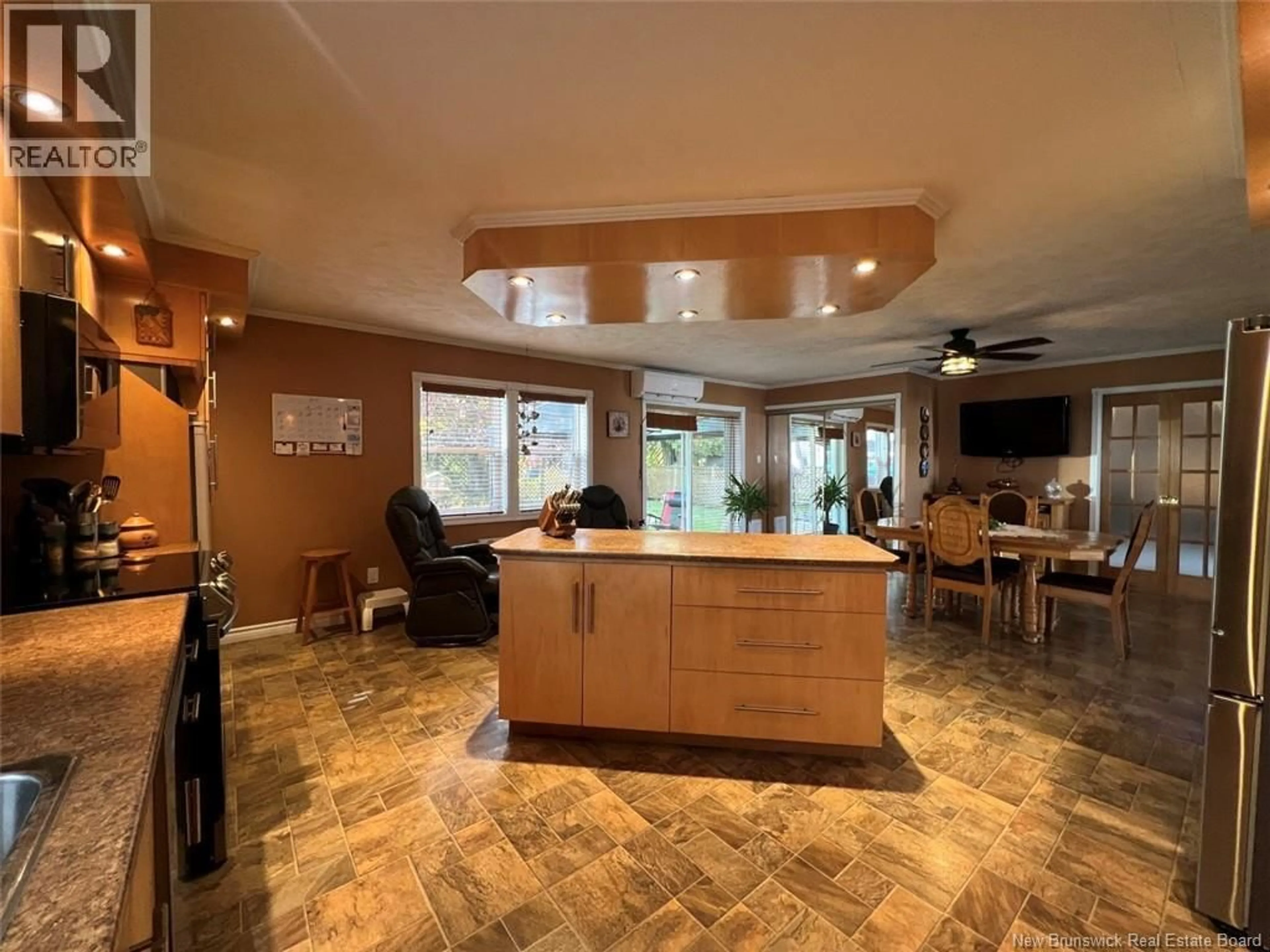 Open concept kitchen, ceramic/tile floor for 55 39TH AVENUE, Edmundston New Brunswick E3V2X1