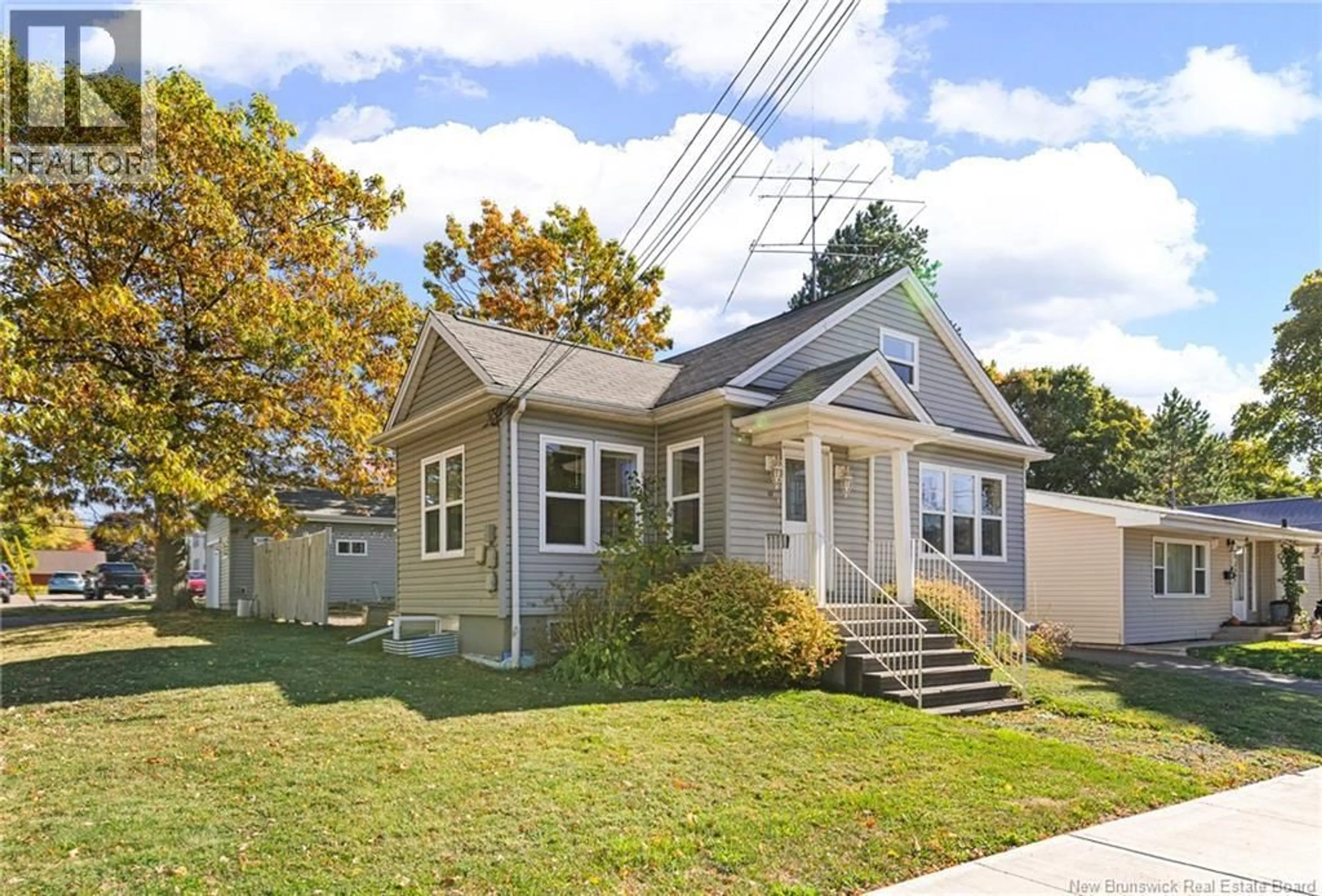 Home with vinyl exterior material, street for 67 PETER ST, Moncton New Brunswick E1A3W3