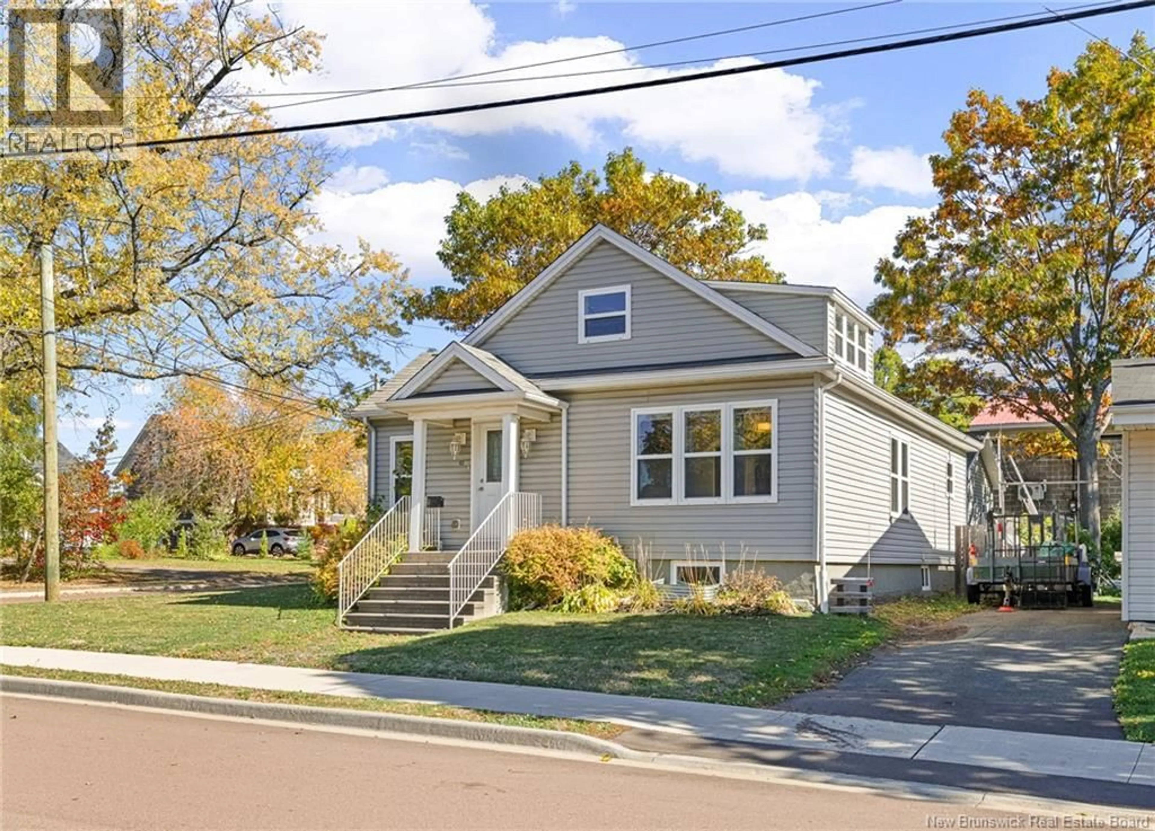 Home with vinyl exterior material, street for 67 PETER ST, Moncton New Brunswick E1A3W3