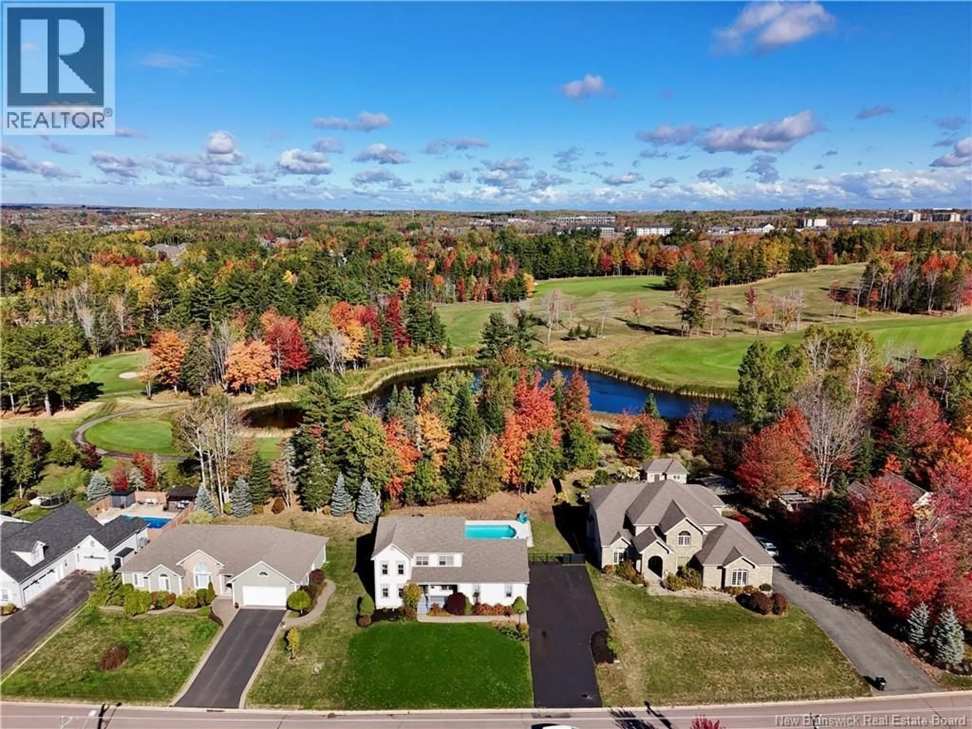 A pic from outside/outdoor area/front of a property/back of a property/a pic from drone, water/lake/river/ocean view for 94 DU GOLF, Dieppe New Brunswick E1A8J6
