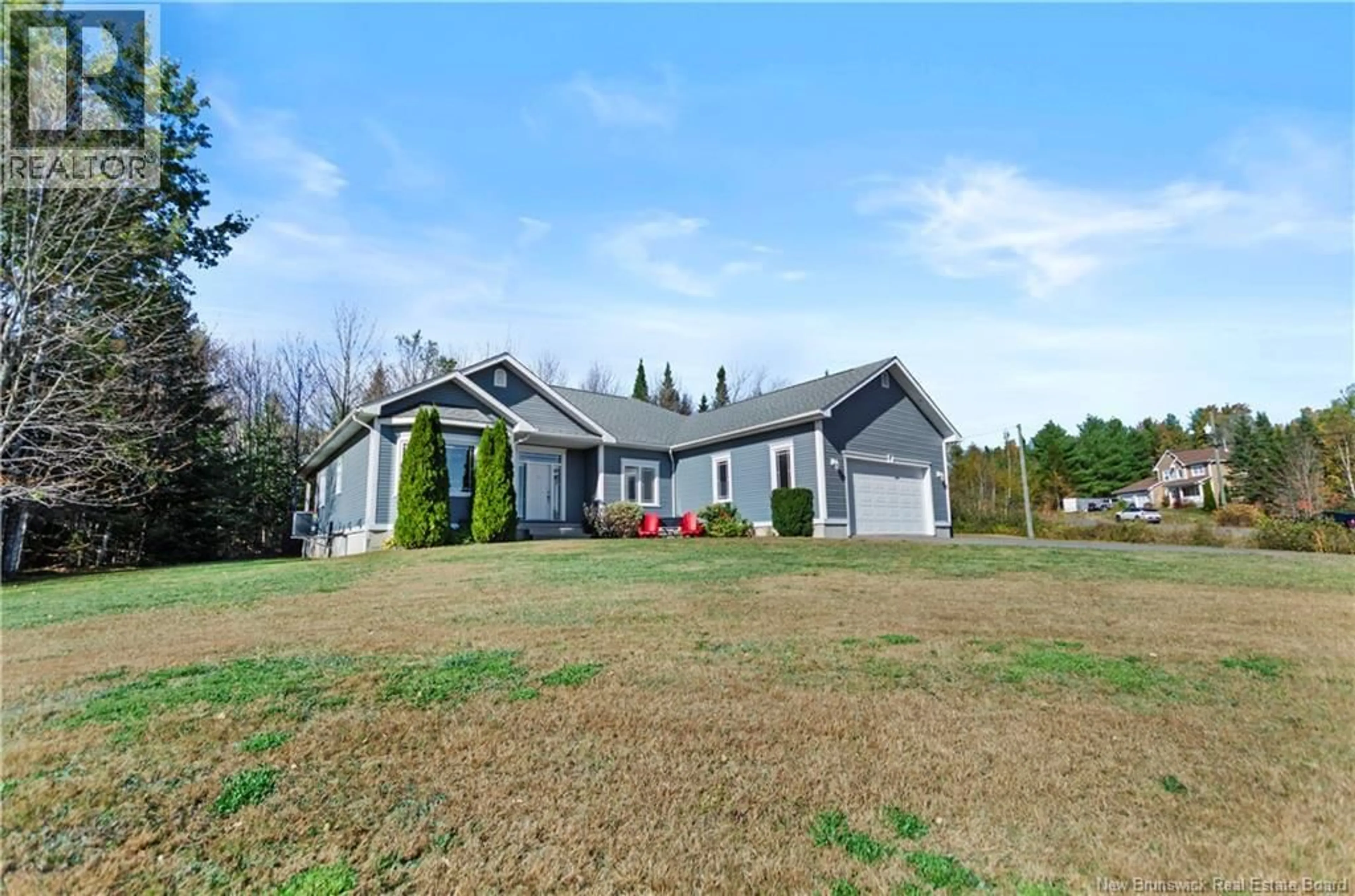 A pic from outside/outdoor area/front of a property/back of a property/a pic from drone, unknown for 7 STARLING CRESCENT, Hanwell New Brunswick E3E2P8