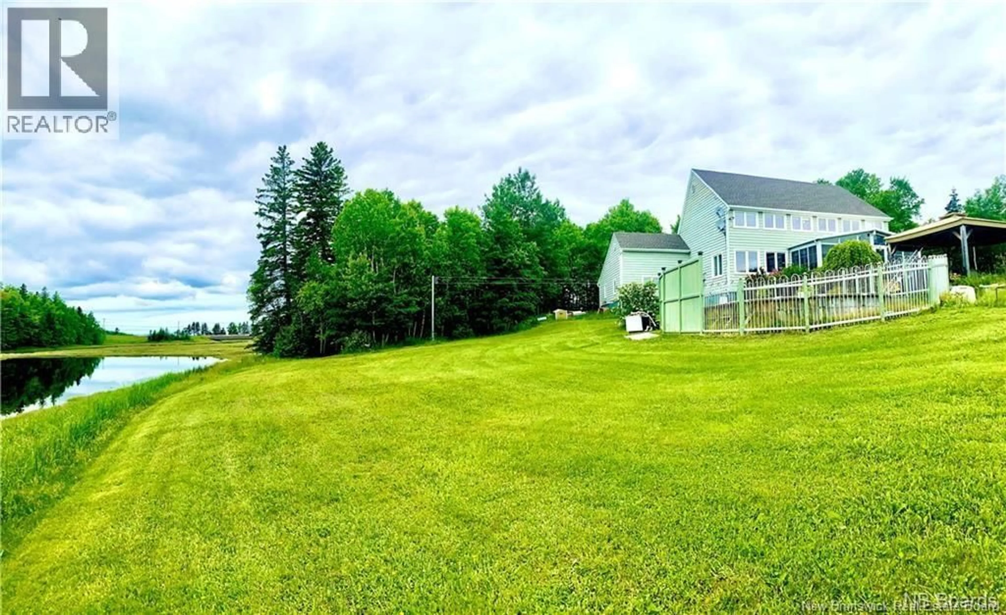 A pic from outside/outdoor area/front of a property/back of a property/a pic from drone, water/lake/river/ocean view for 490A ST PIERRE OUEST BOULEVARD, Caraquet New Brunswick E1W1A3