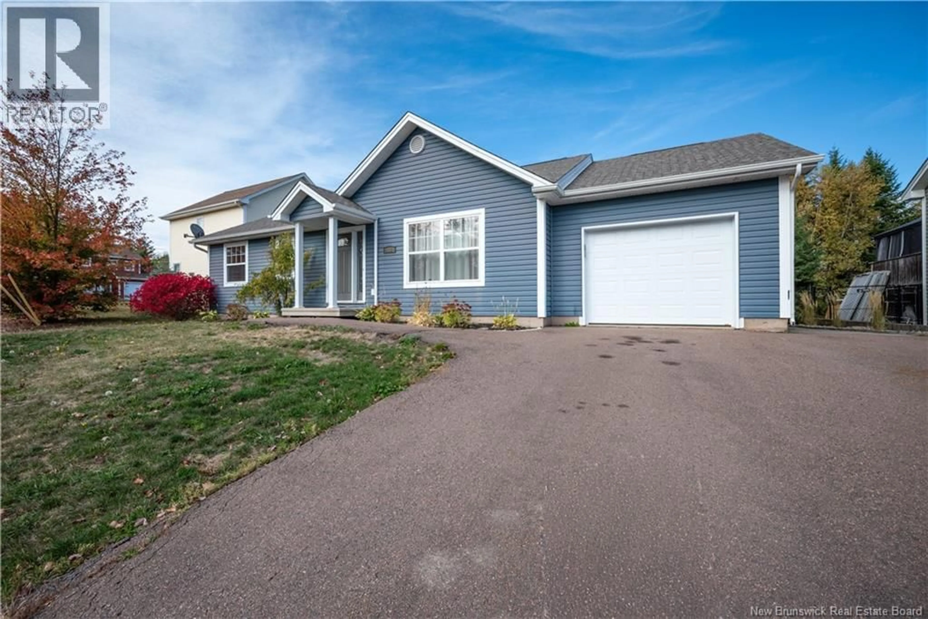 Home with vinyl exterior material, street for 16 MELINDA, Dieppe New Brunswick E1A0W8