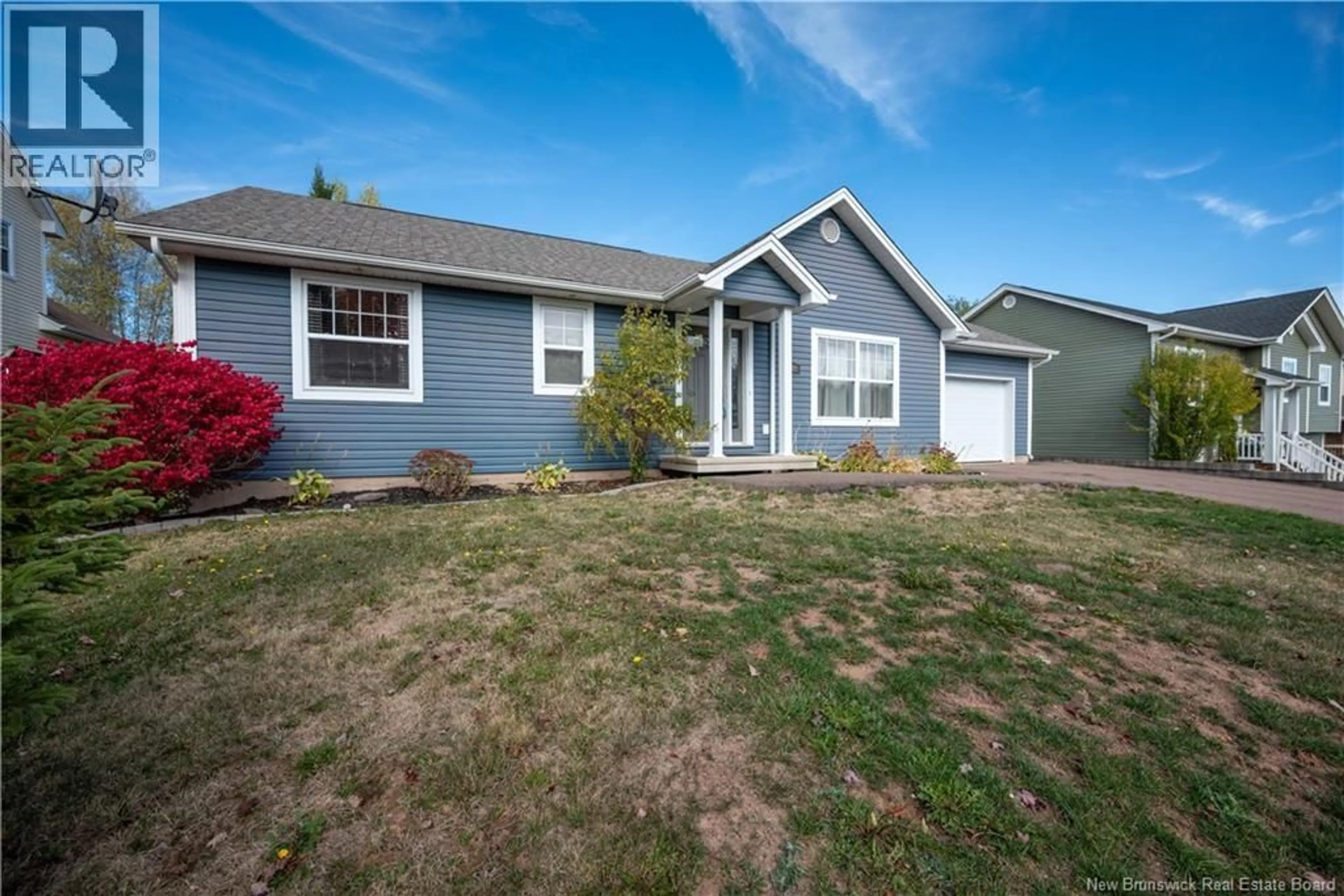 Home with vinyl exterior material, street for 16 MELINDA, Dieppe New Brunswick E1A0W8